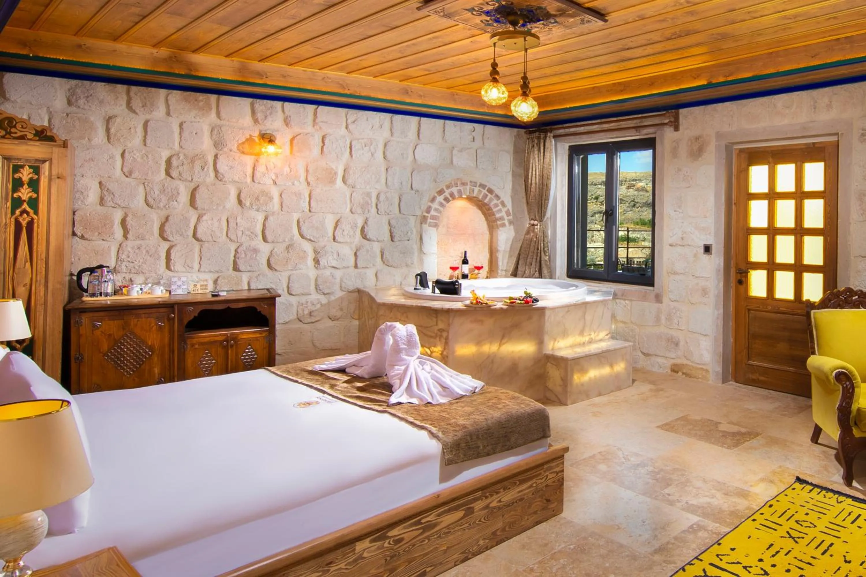 Bed in Dionysos Cave Cappadocia Hotel