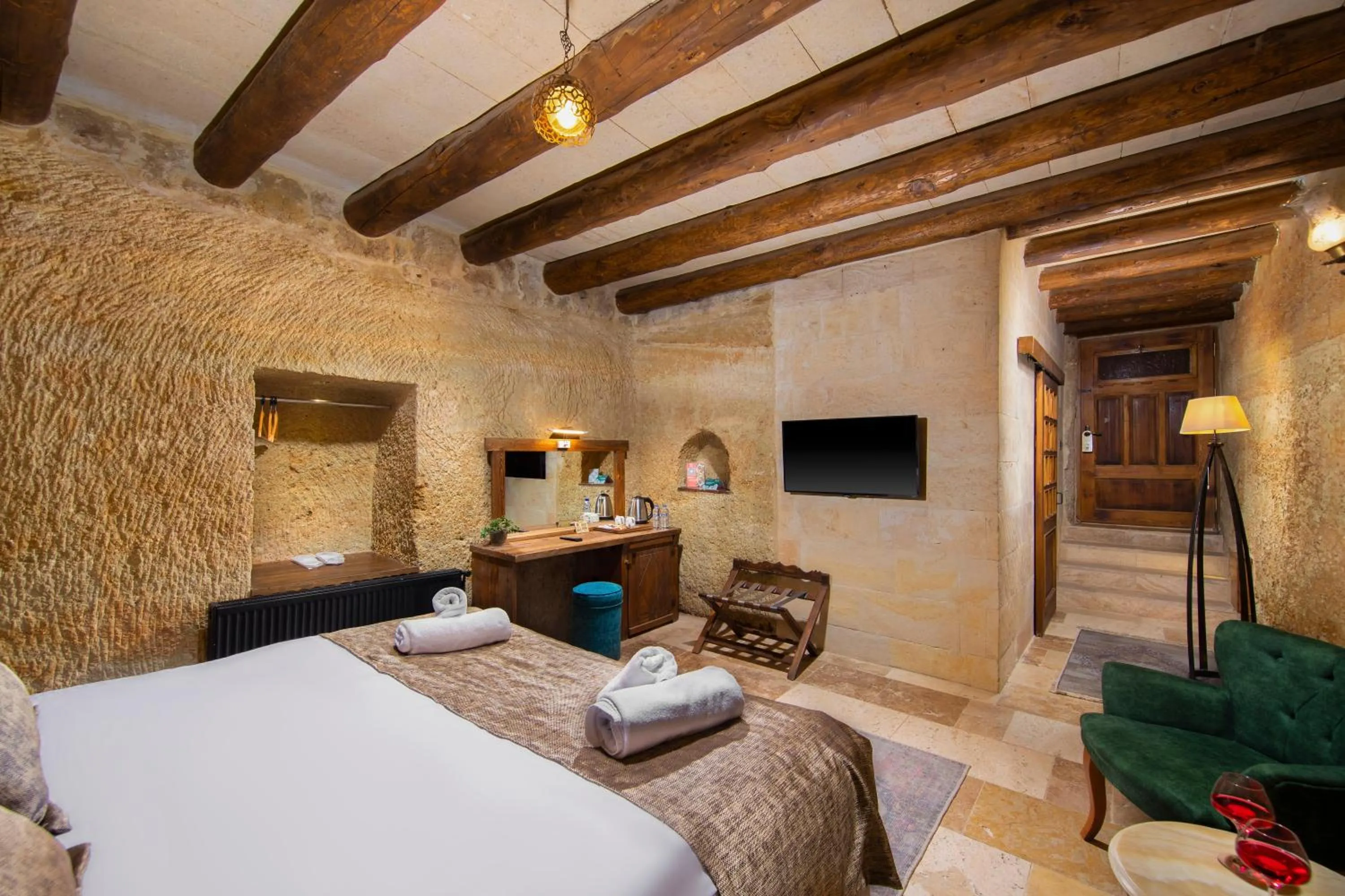 Bed in Dionysos Cave Cappadocia Hotel