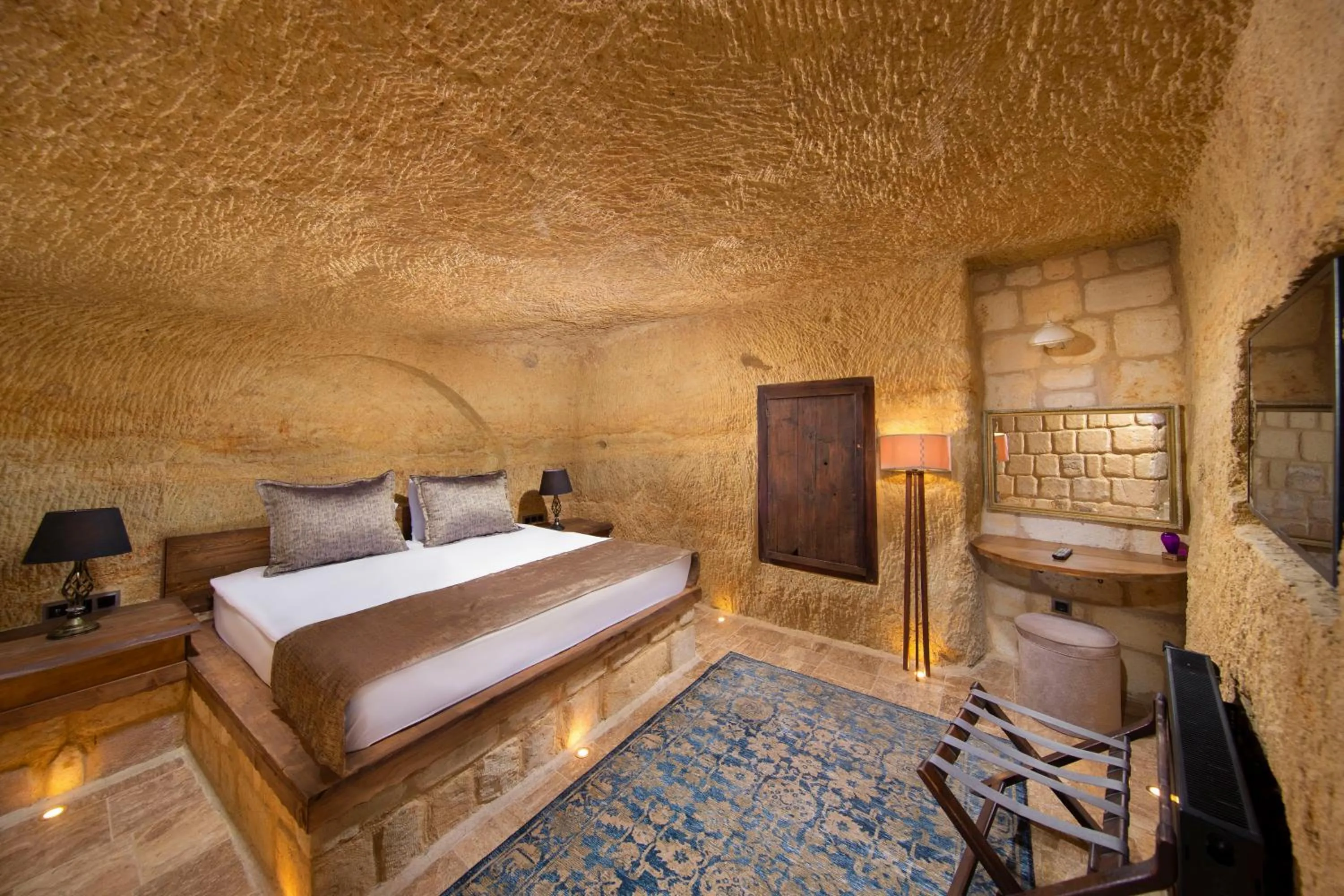 Bed in Dionysos Cave Cappadocia Hotel