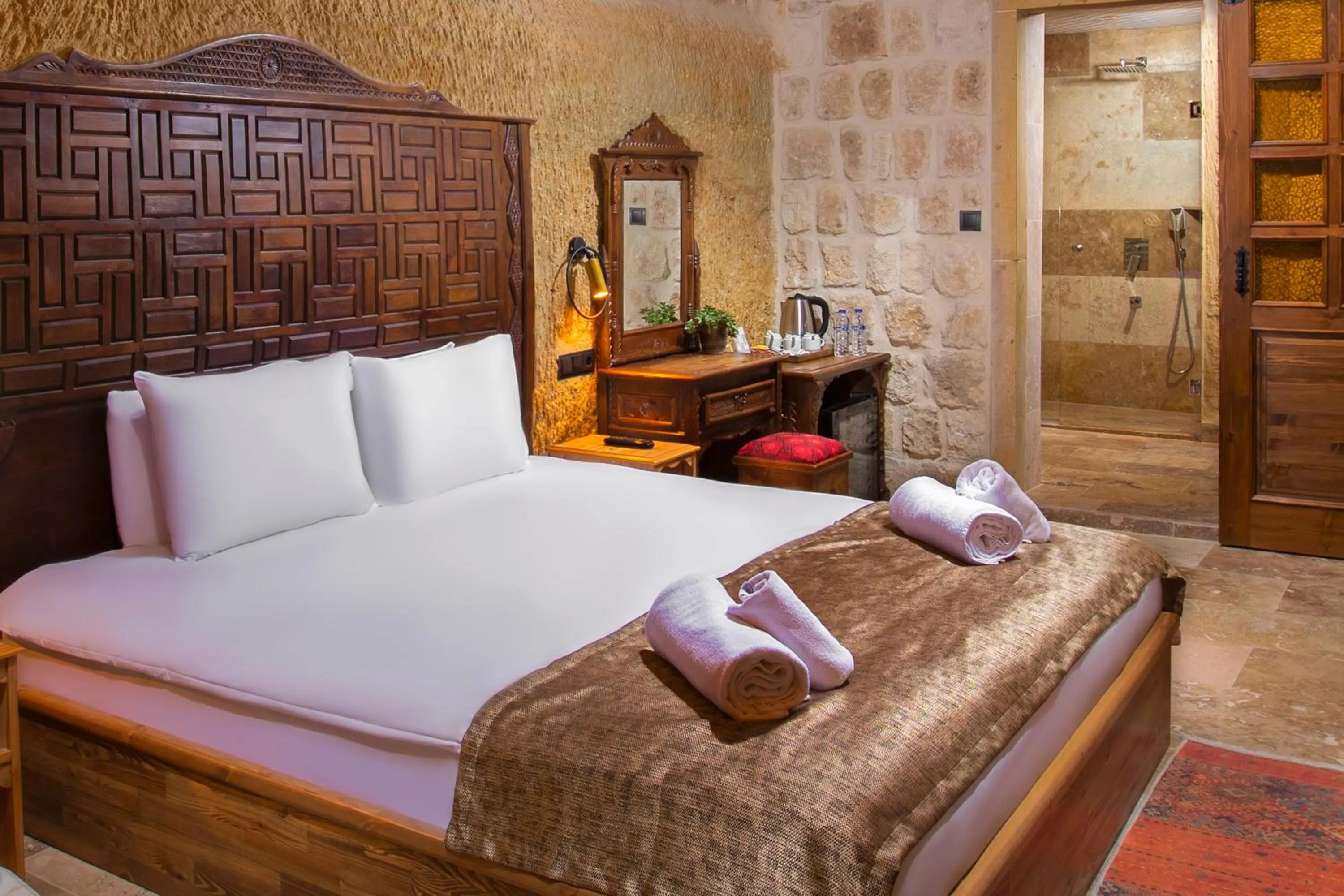 Bed in Dionysos Cave Cappadocia Hotel