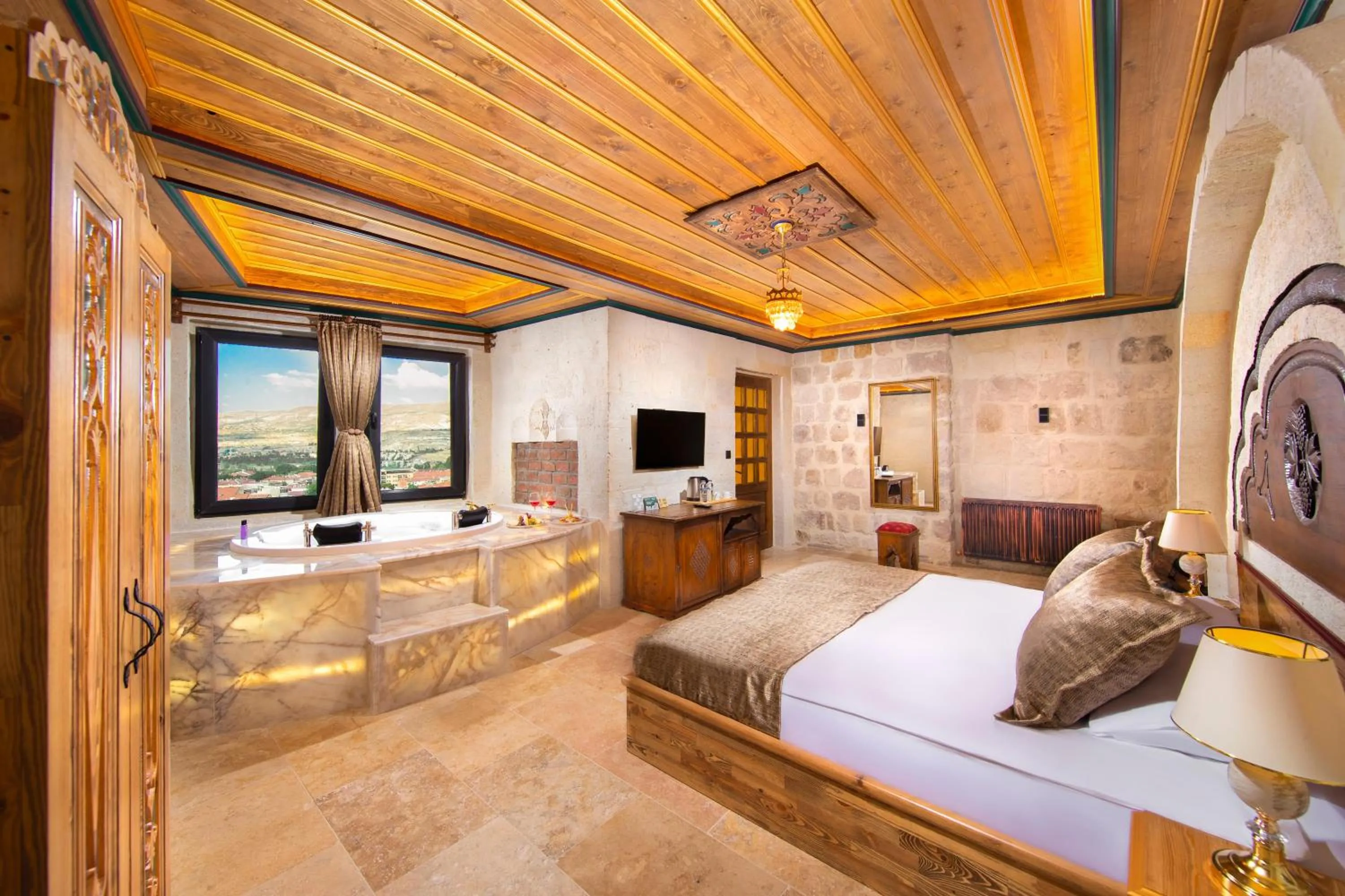 Bed in Dionysos Cave Cappadocia Hotel