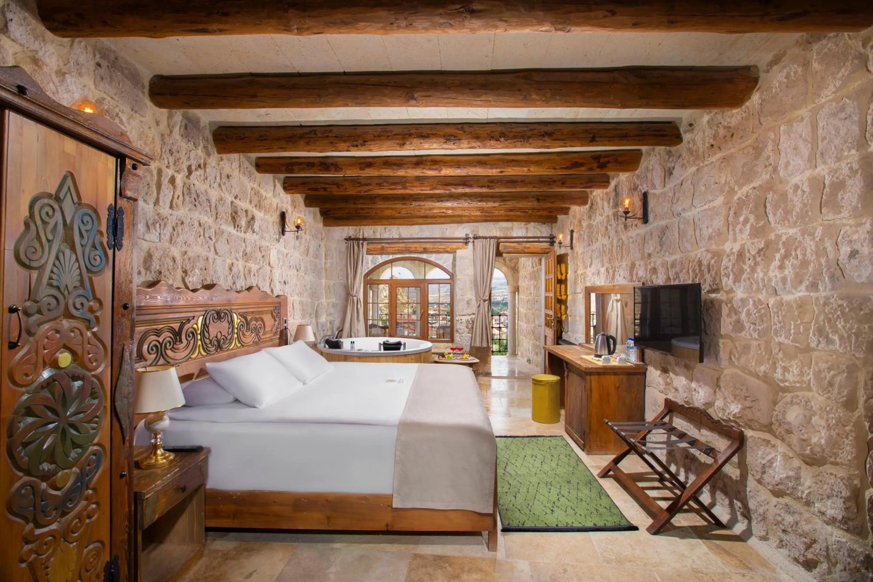 Bed in Dionysos Cave Cappadocia Hotel