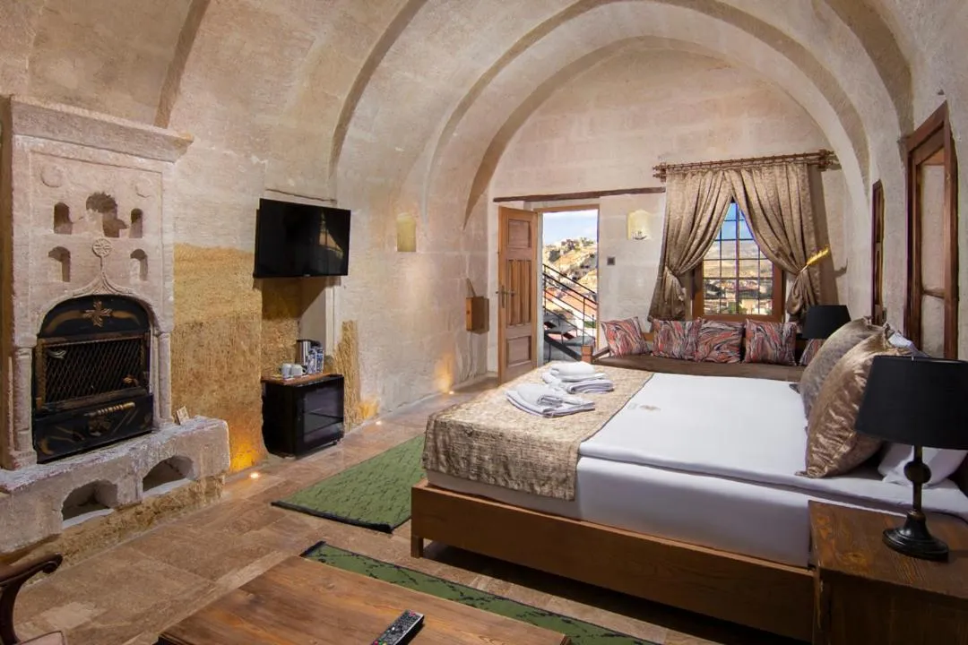 TV and multimedia, Bed in Dionysos Cave Cappadocia Hotel