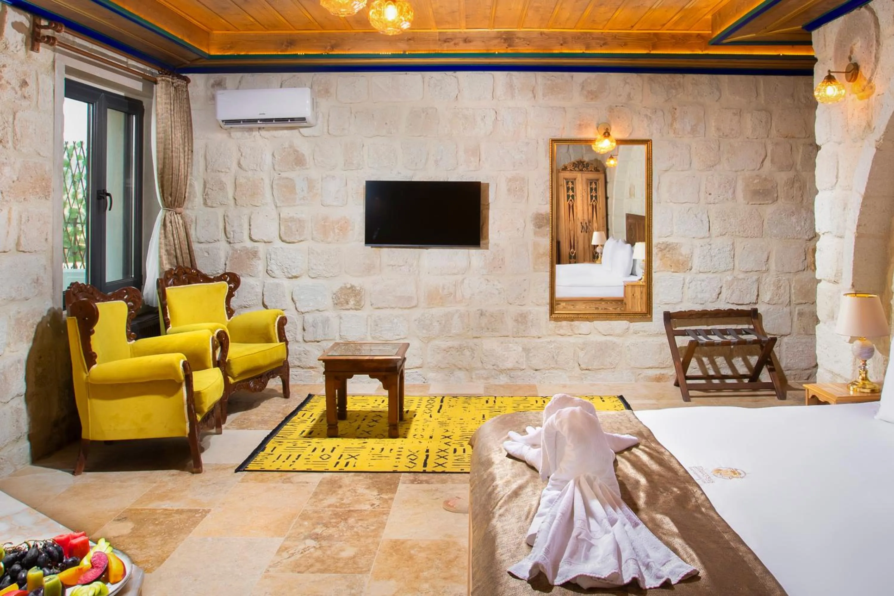 Bed in Dionysos Cave Cappadocia Hotel