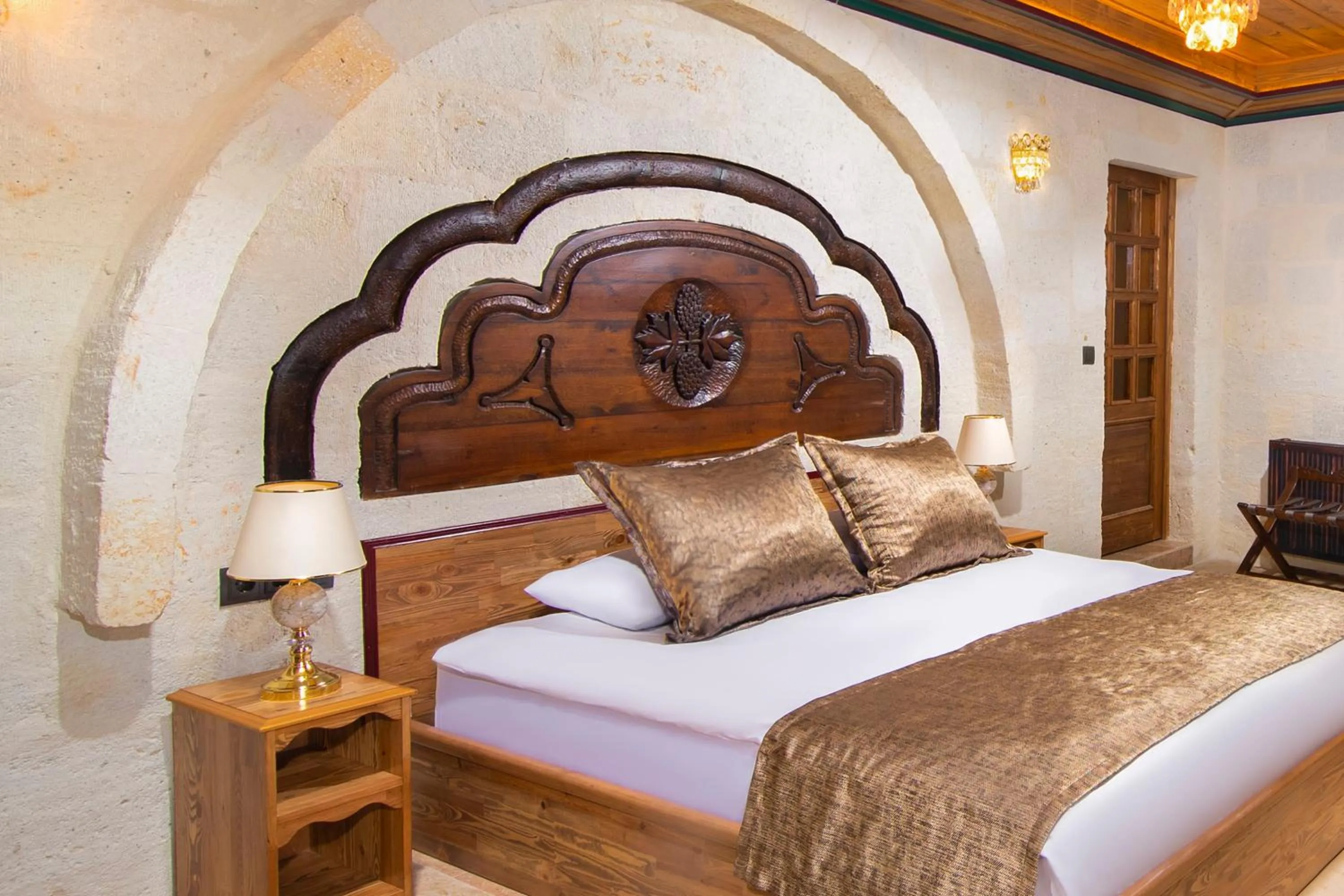 Bed in Dionysos Cave Cappadocia Hotel