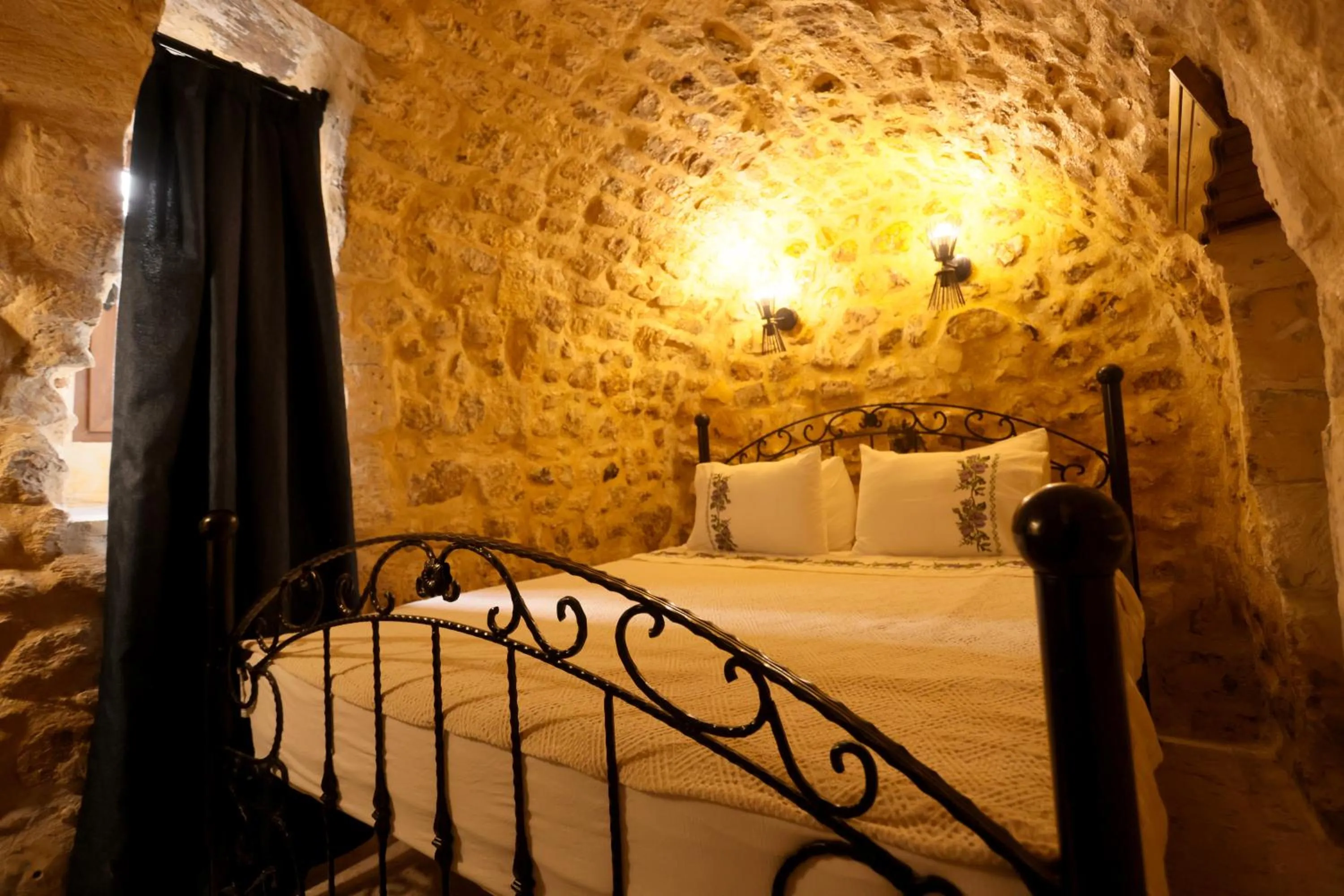 Bed in ASTARTE HOTEL