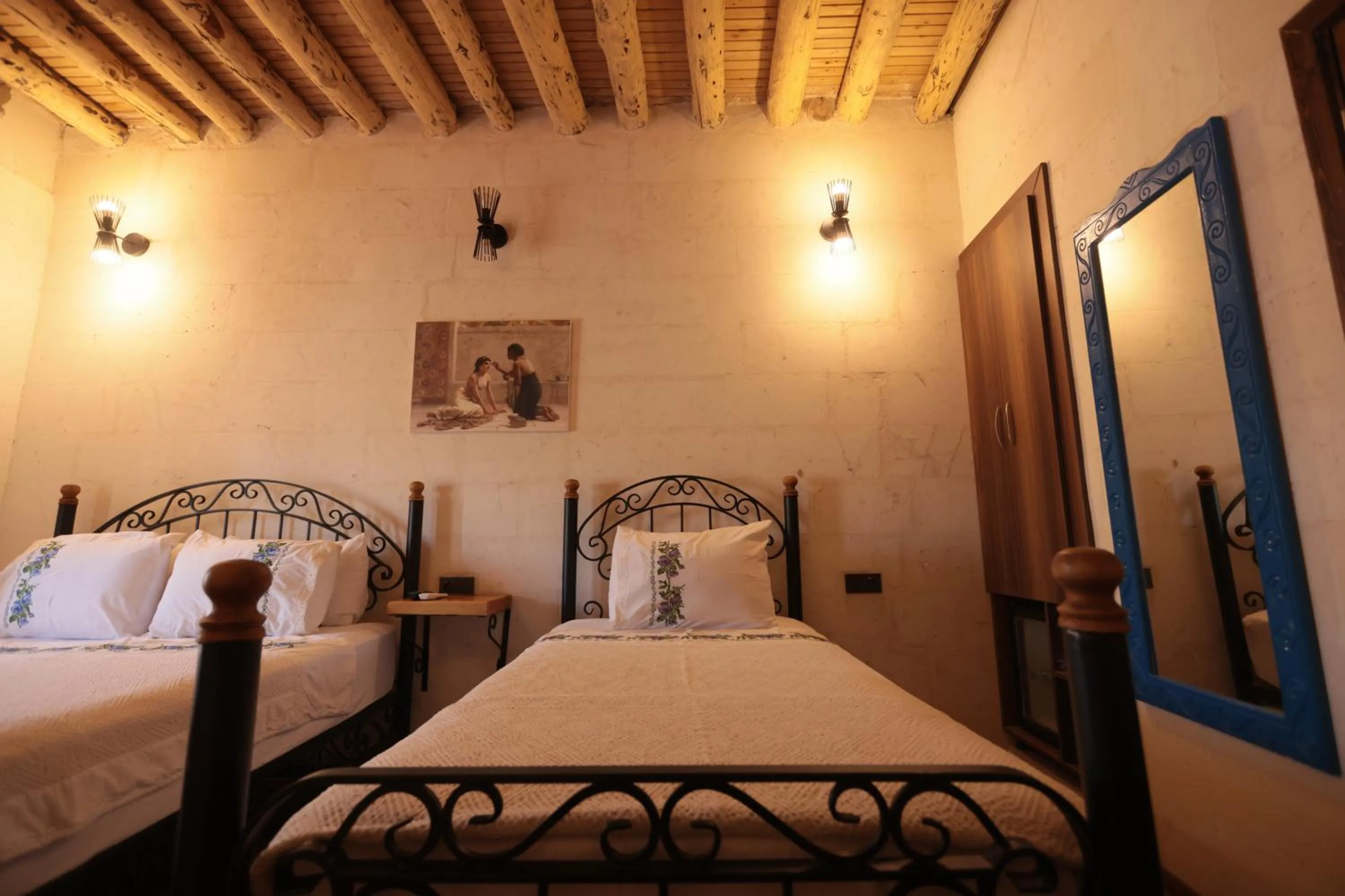 Bed in ASTARTE HOTEL