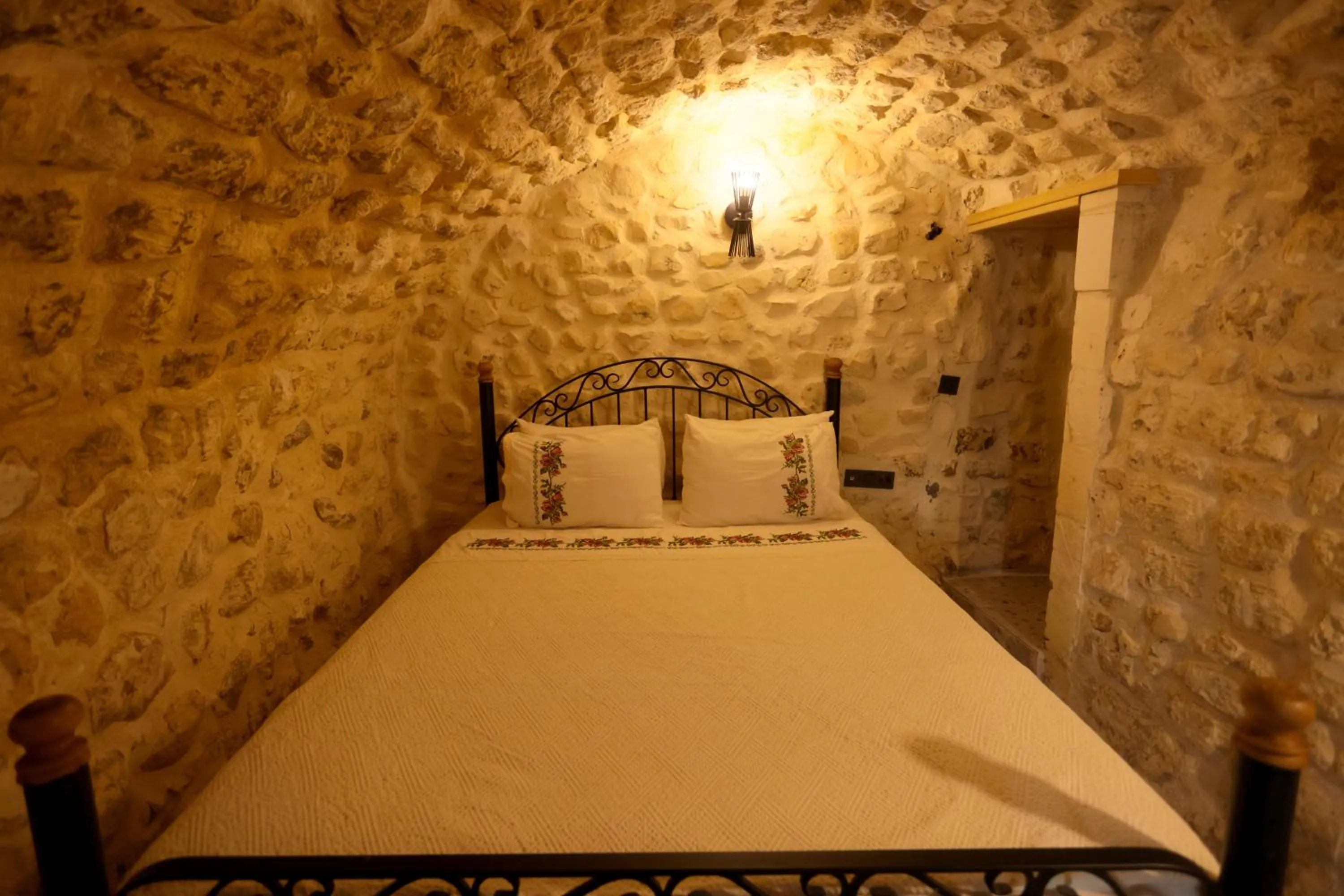 Bed in ASTARTE HOTEL