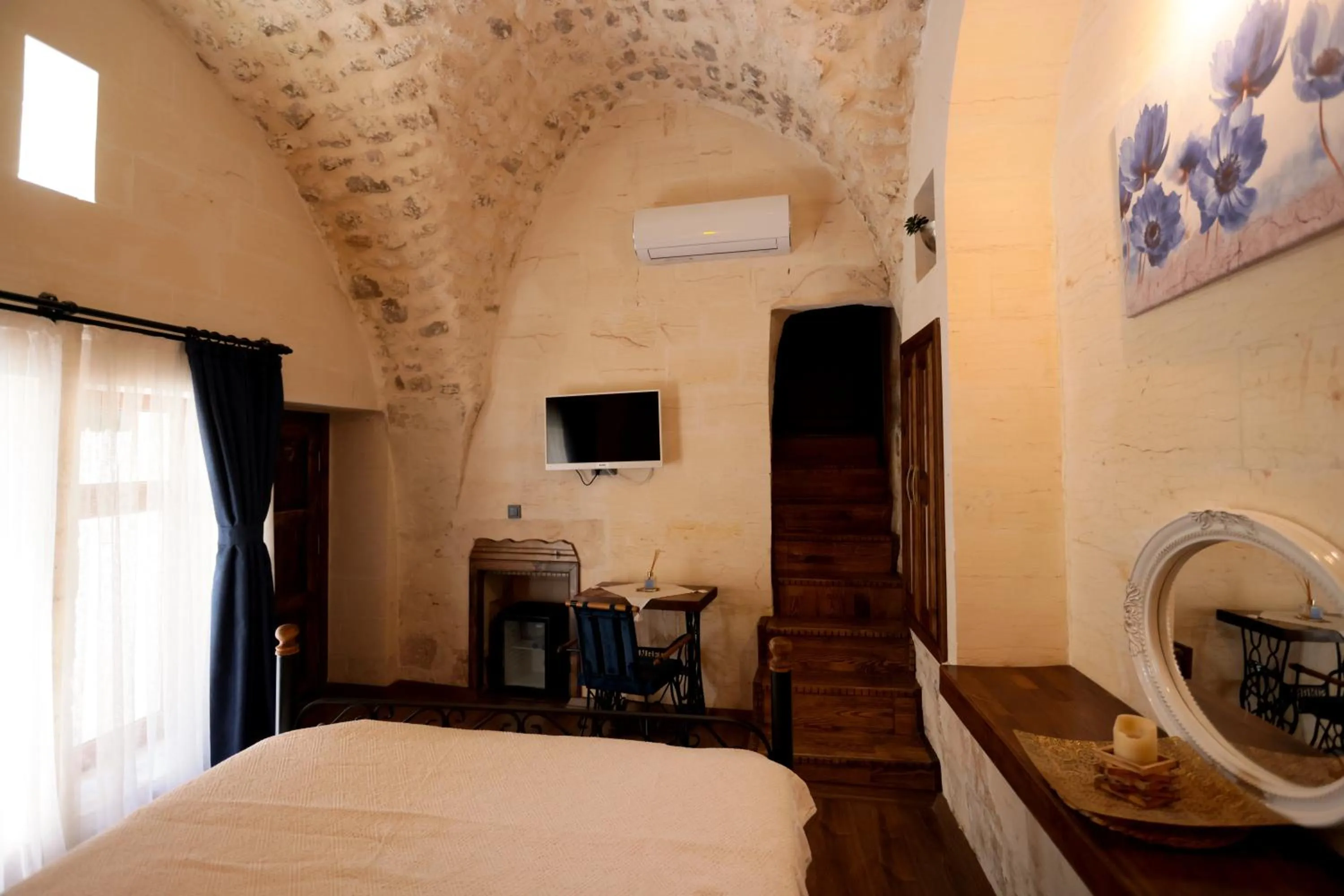 Bed in ASTARTE HOTEL