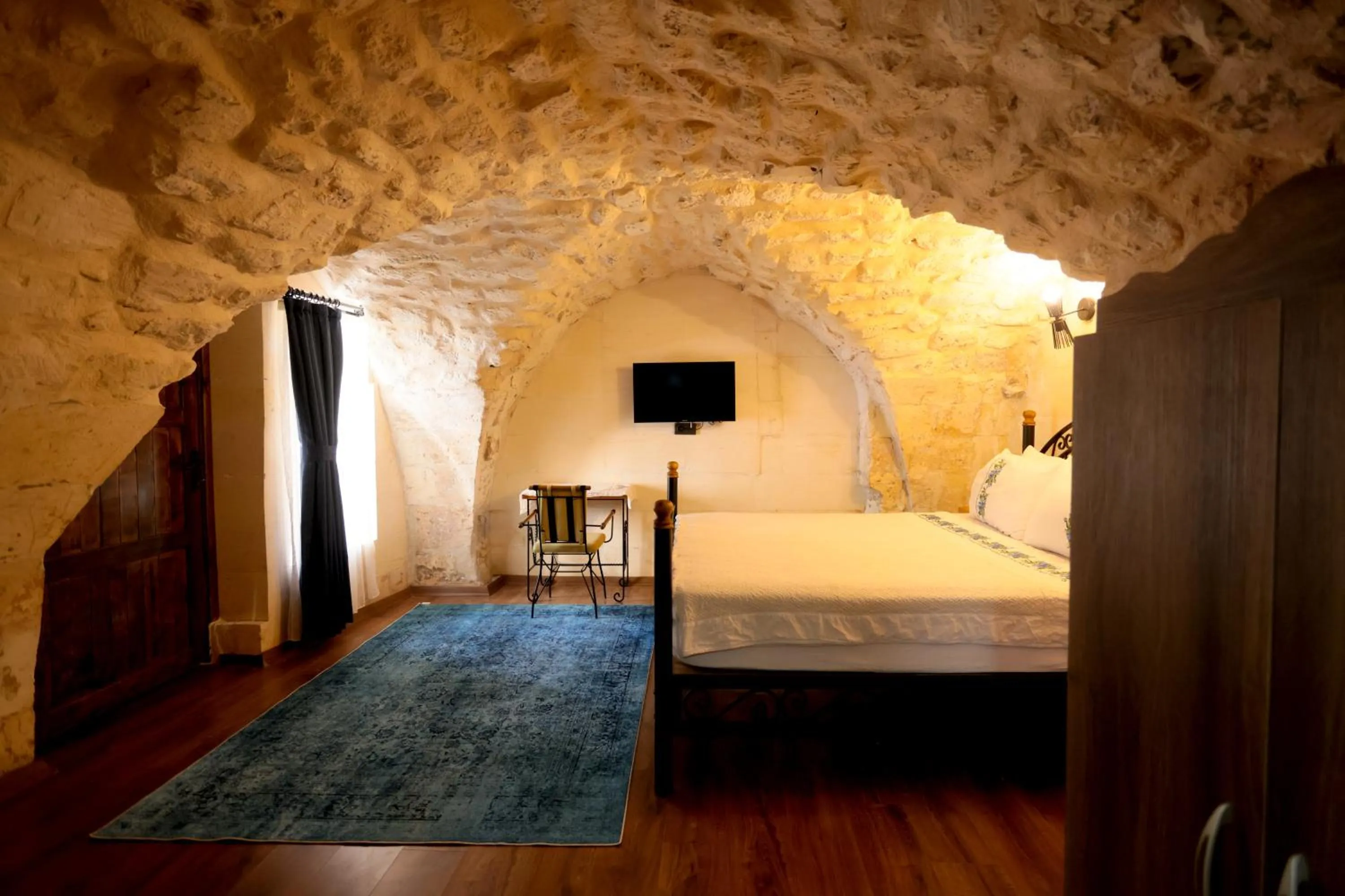 Bed in ASTARTE HOTEL