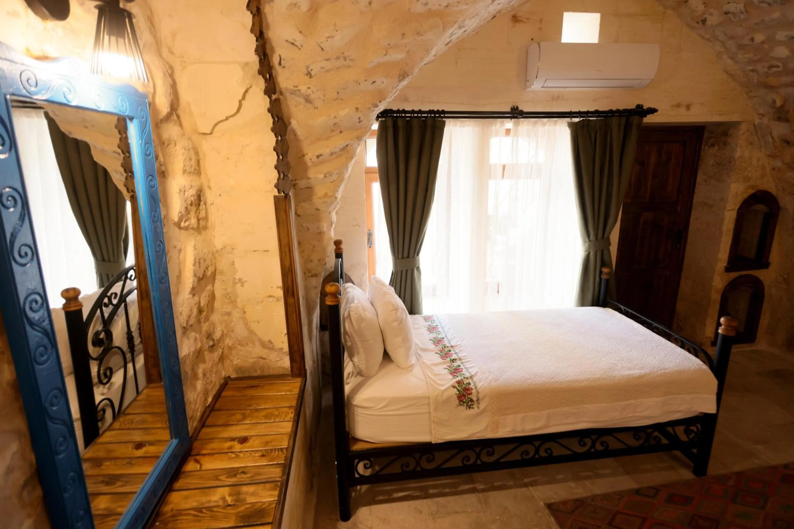 Bed in ASTARTE HOTEL