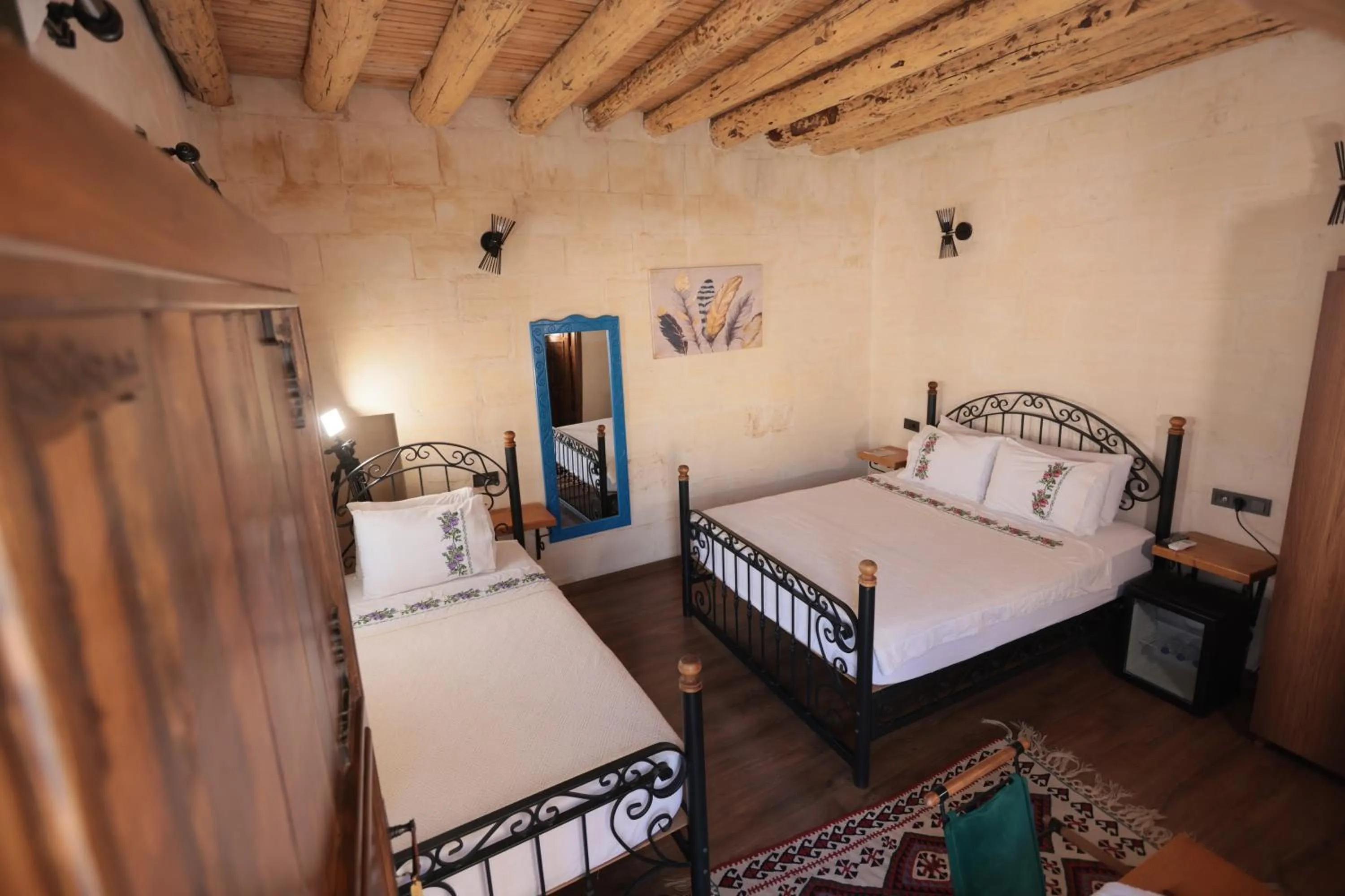 Bed in ASTARTE HOTEL