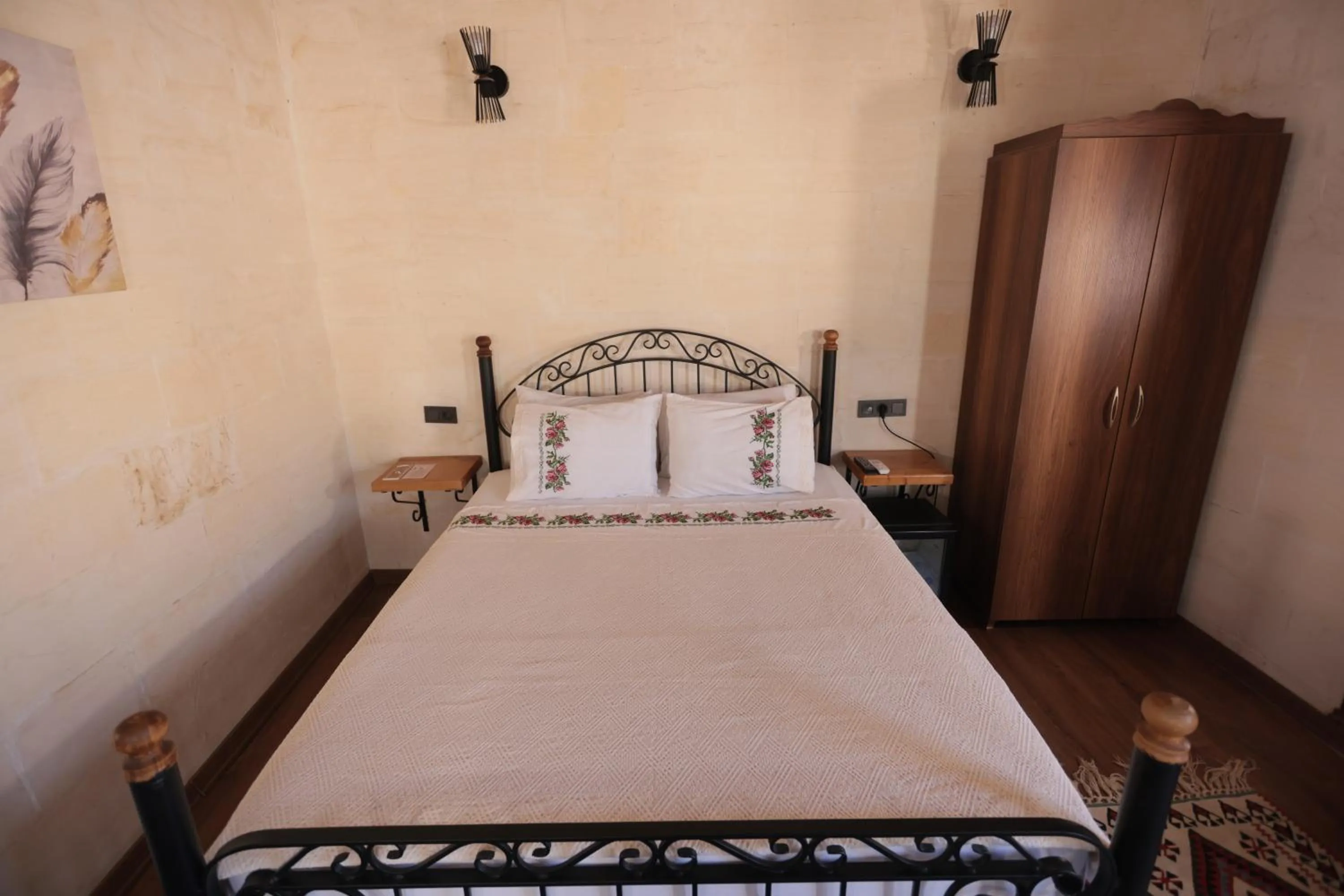 Bed in ASTARTE HOTEL