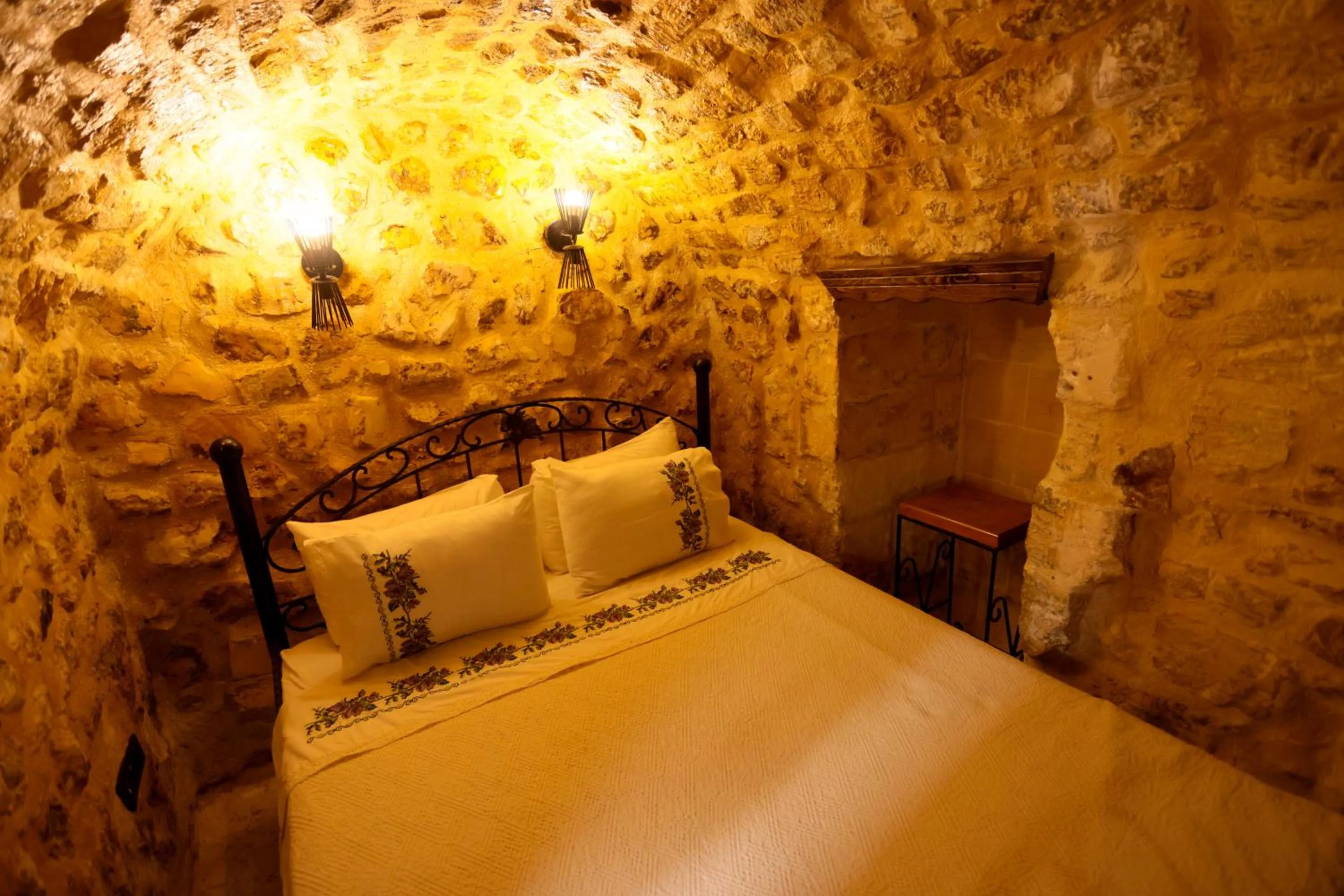 Bed in ASTARTE HOTEL