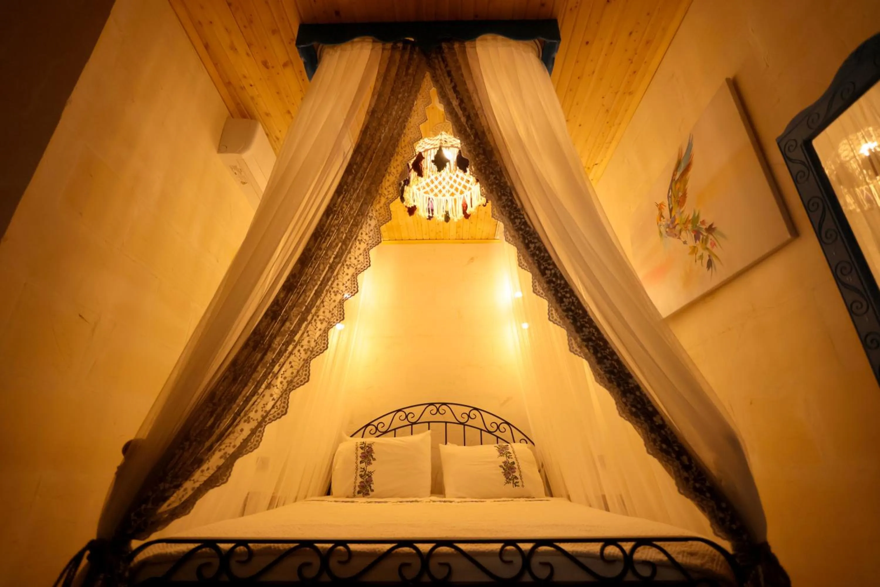 Bed in ASTARTE HOTEL