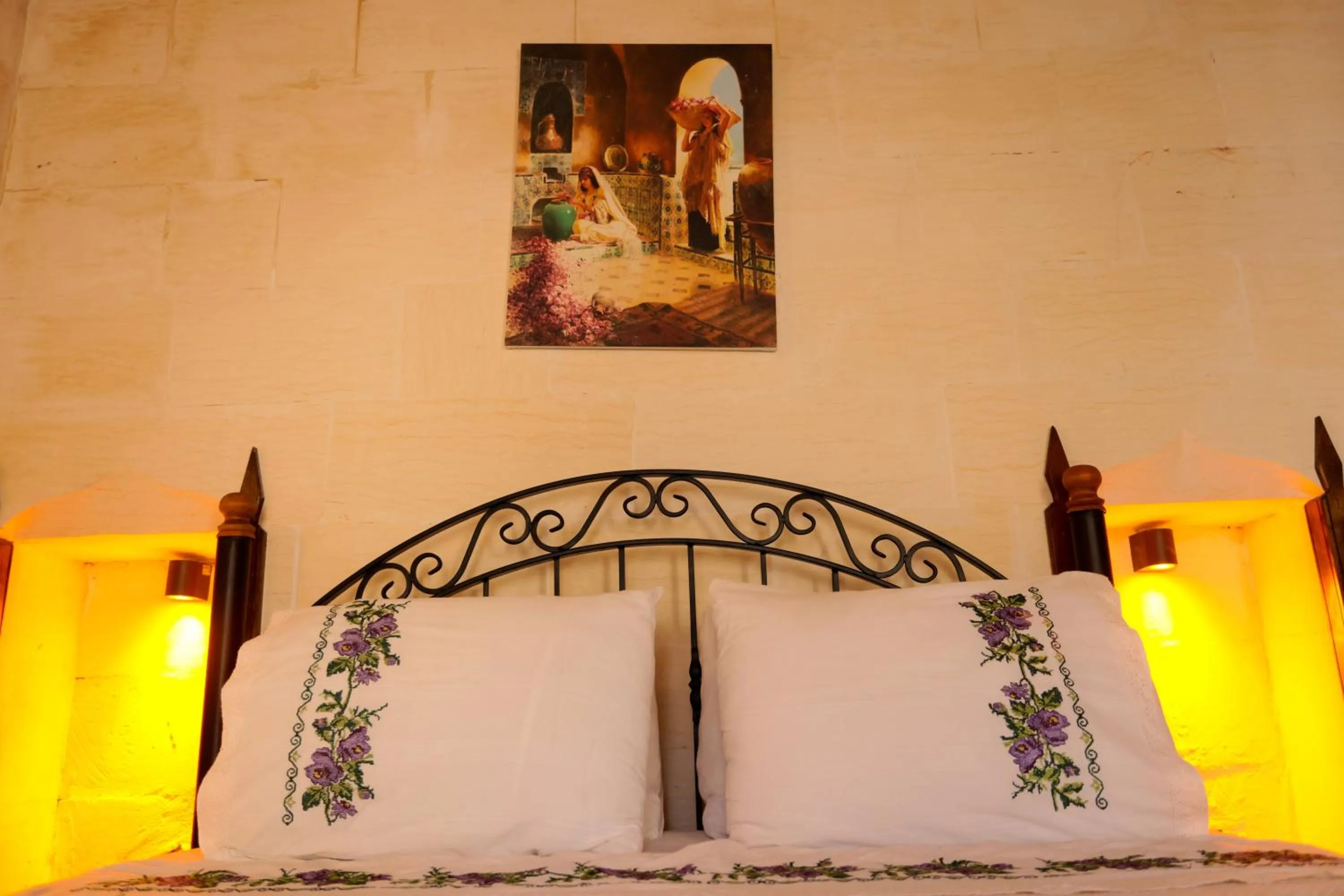 Bed in ASTARTE HOTEL