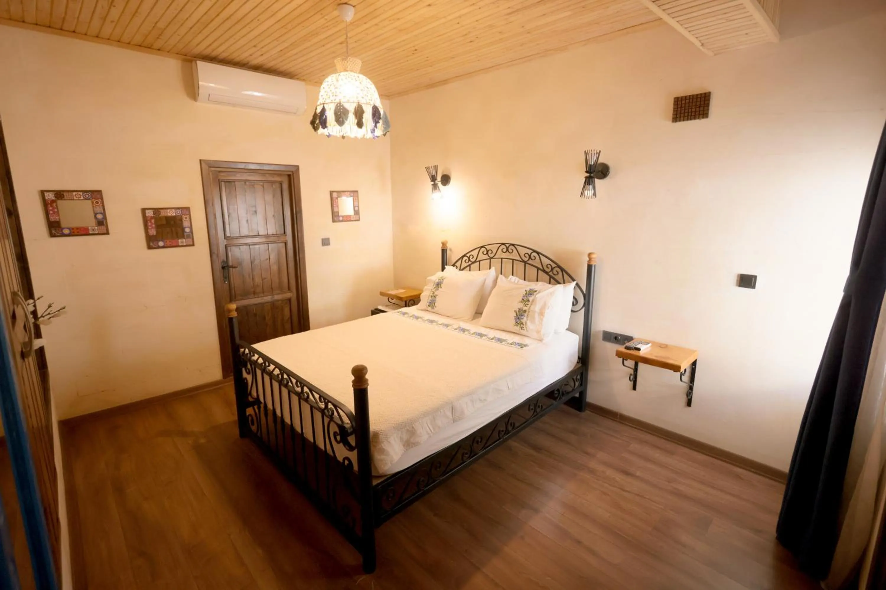 Bed in ASTARTE HOTEL