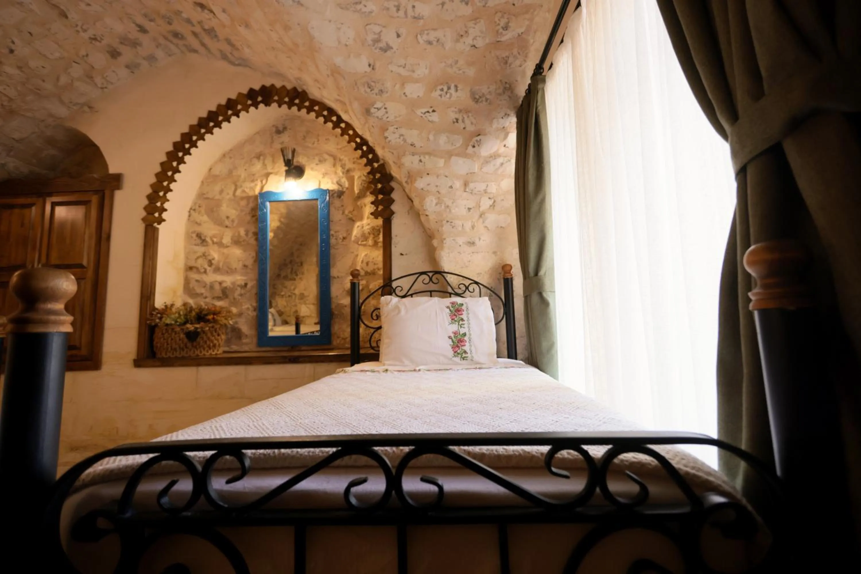 Bed in ASTARTE HOTEL