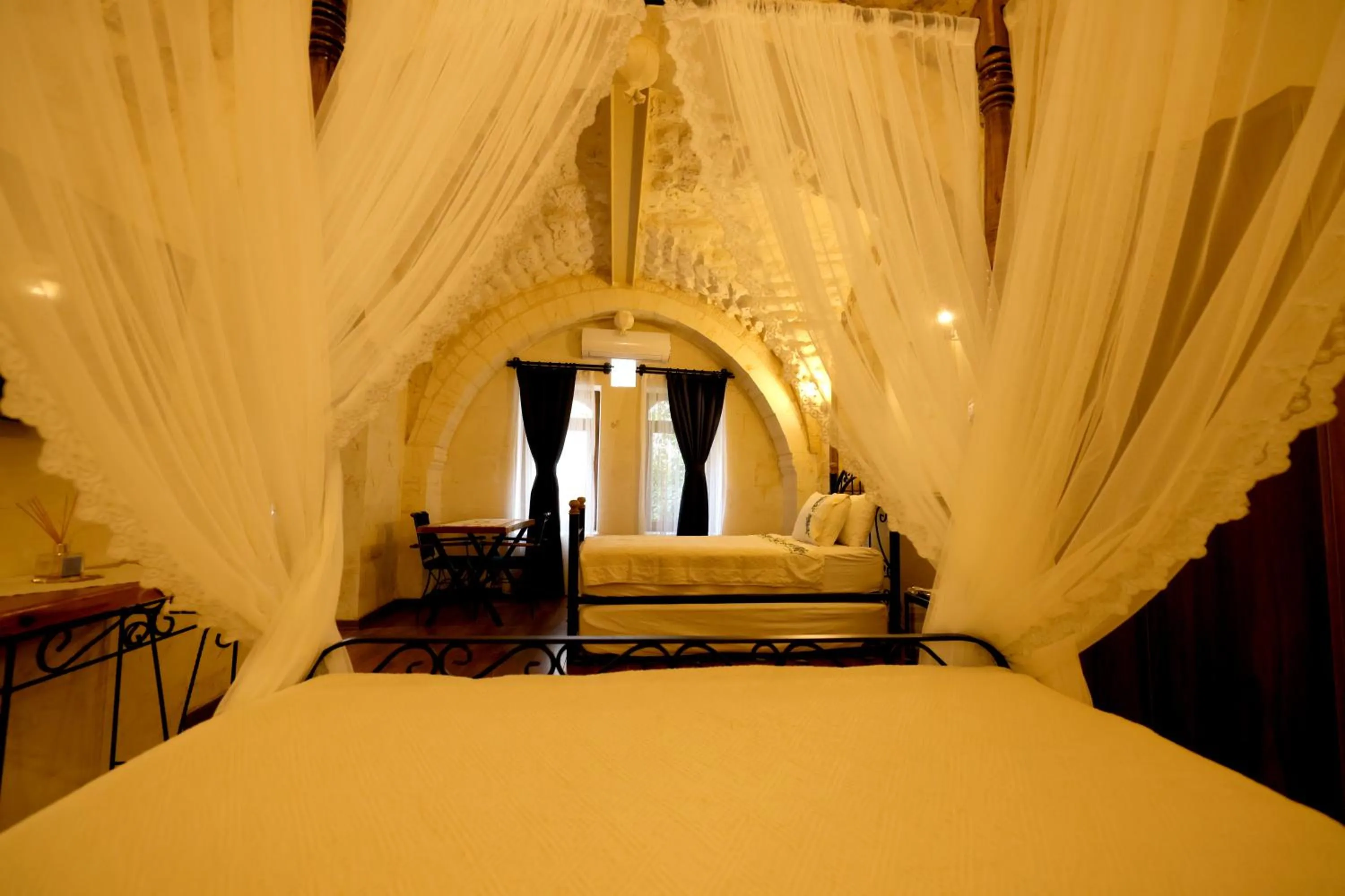 Bed in ASTARTE HOTEL