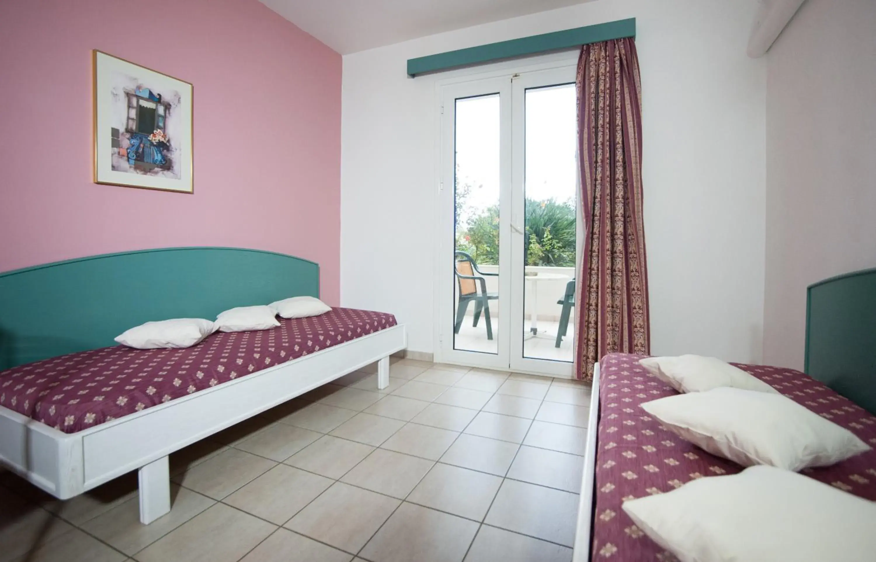 Bed in Theoni Apartments Bed in Theoni Apartments