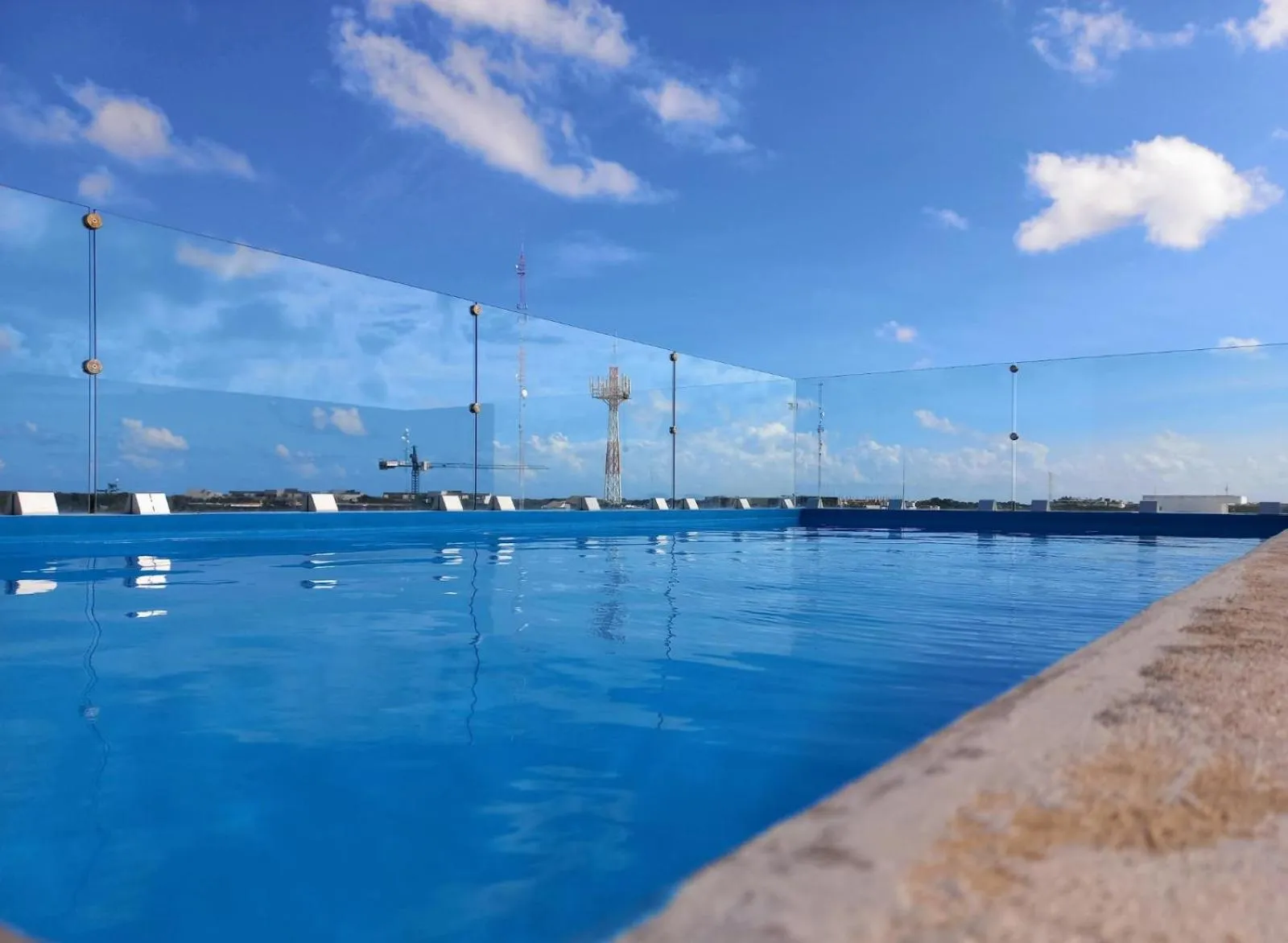 Swimming pool in Cozy and spacious apartment by Tulum 10