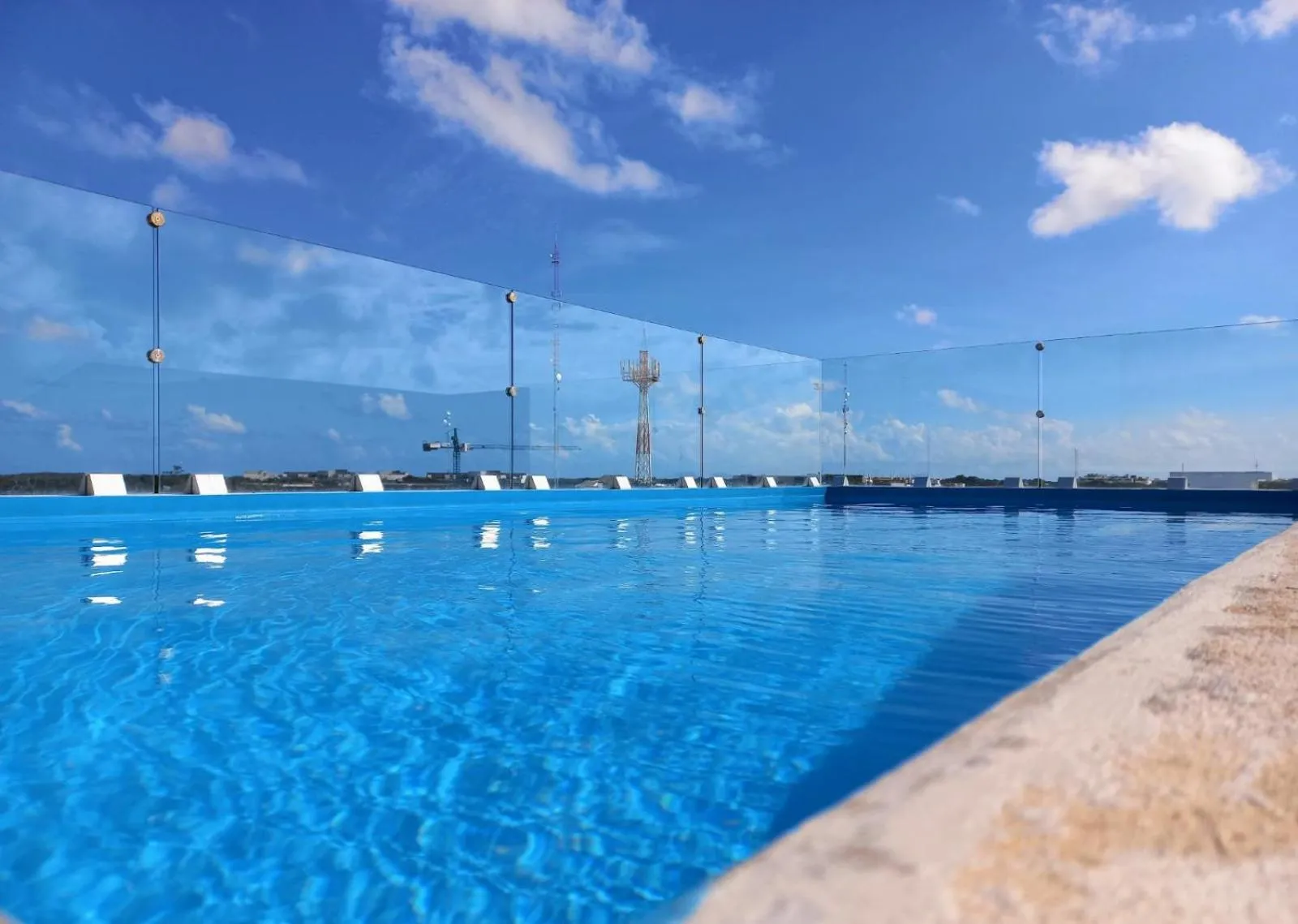 Swimming pool in Cozy and spacious apartment by Tulum 10