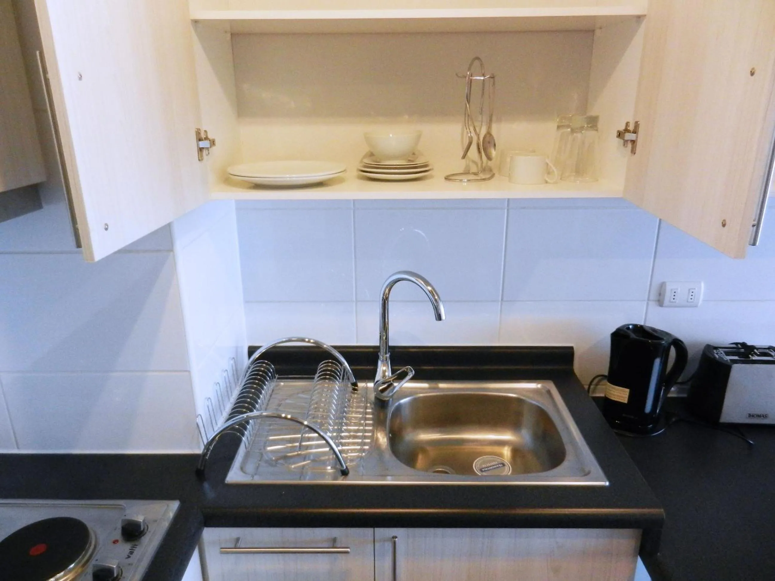 Kitchen or kitchenette in Apartamentos Terrazas de Talca