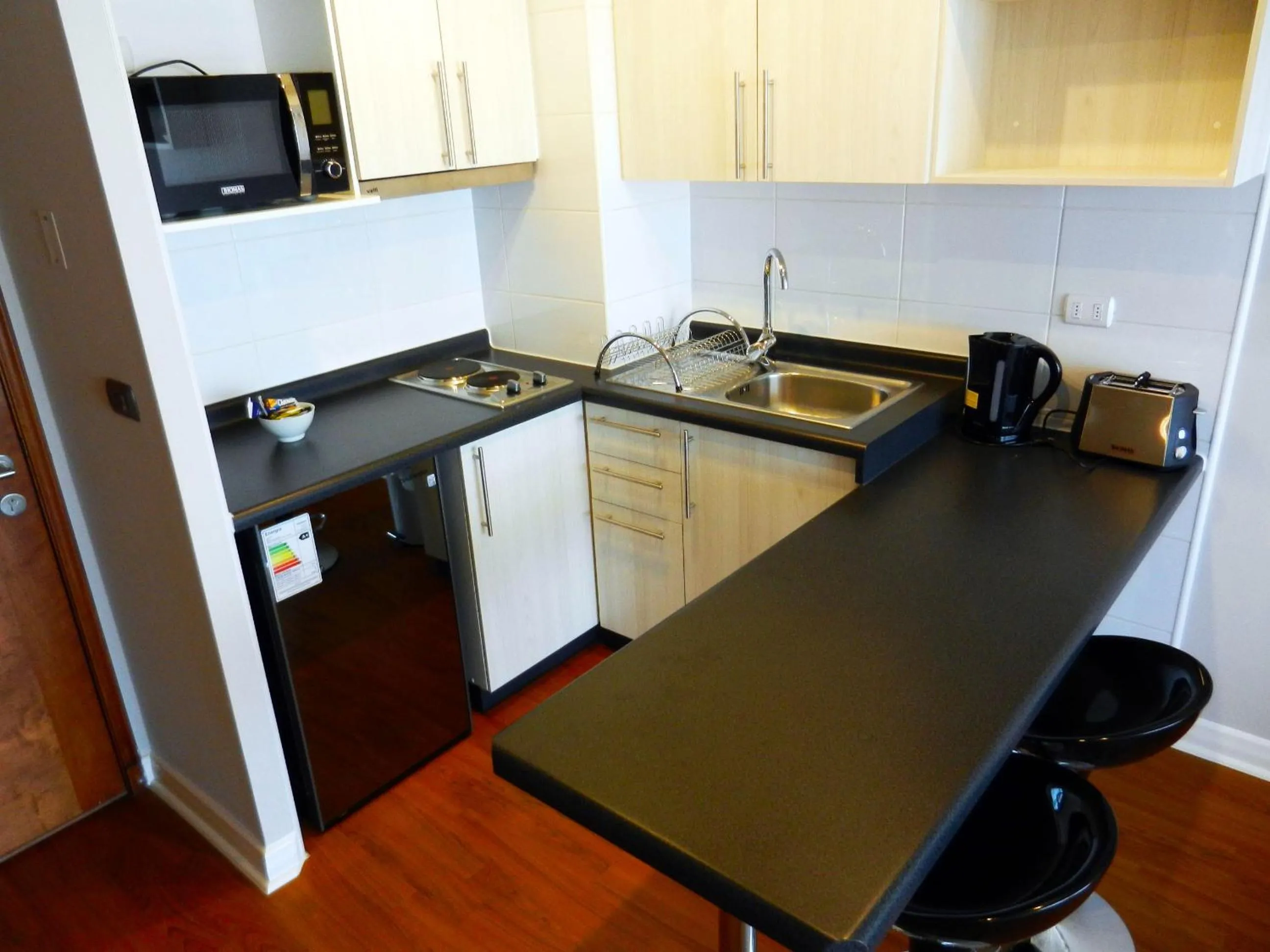 Kitchen or kitchenette in Apartamentos Terrazas de Talca