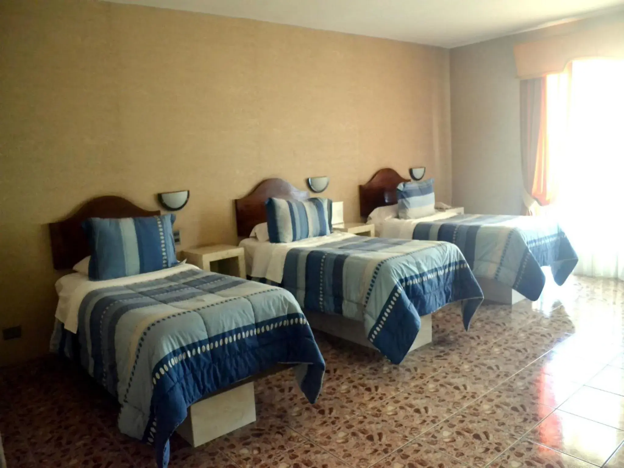 Triple Room in Hotel Costa Pacifico Triple Room in Hotel Costa Pacifico