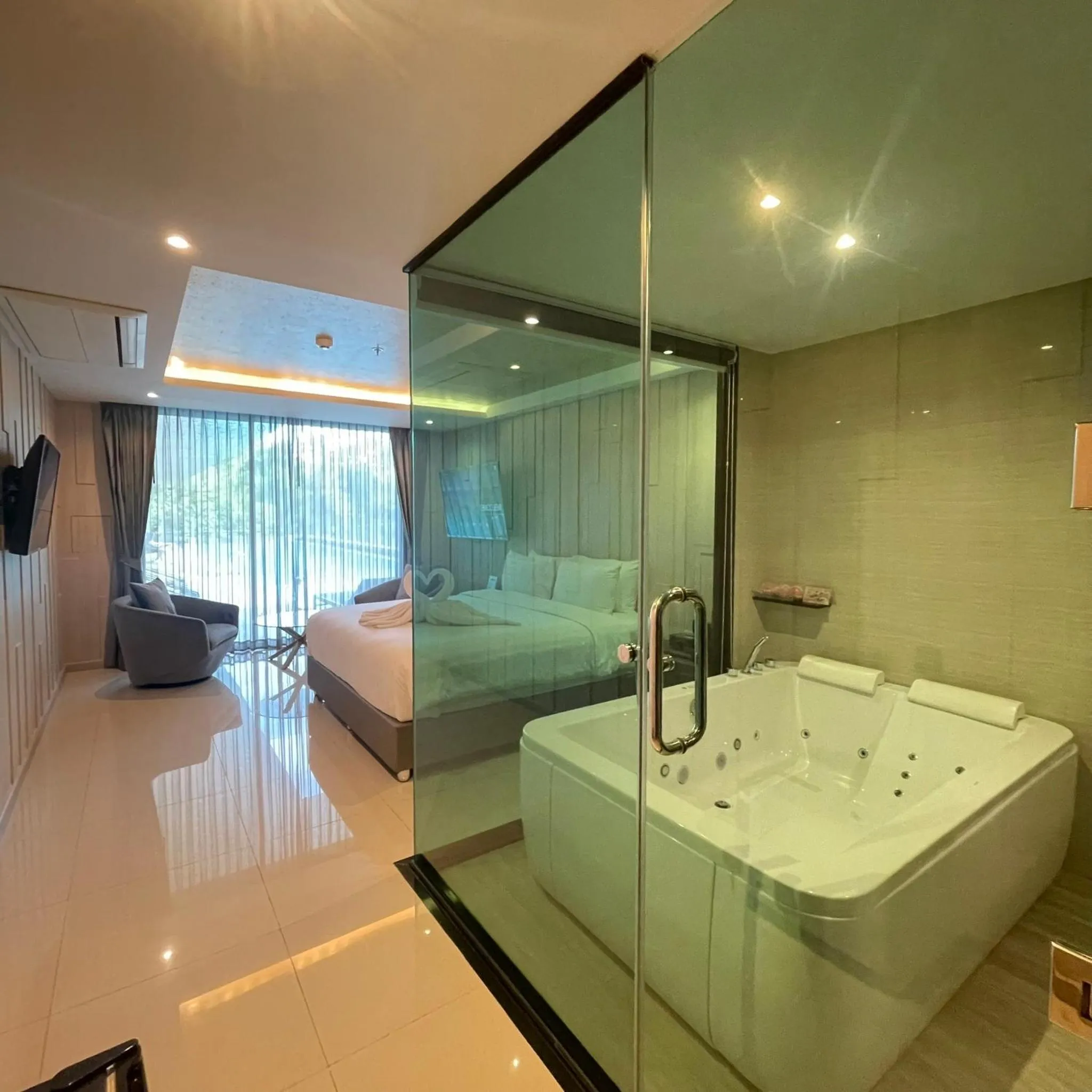 Bed in THE TJ HOTEL Pattaya