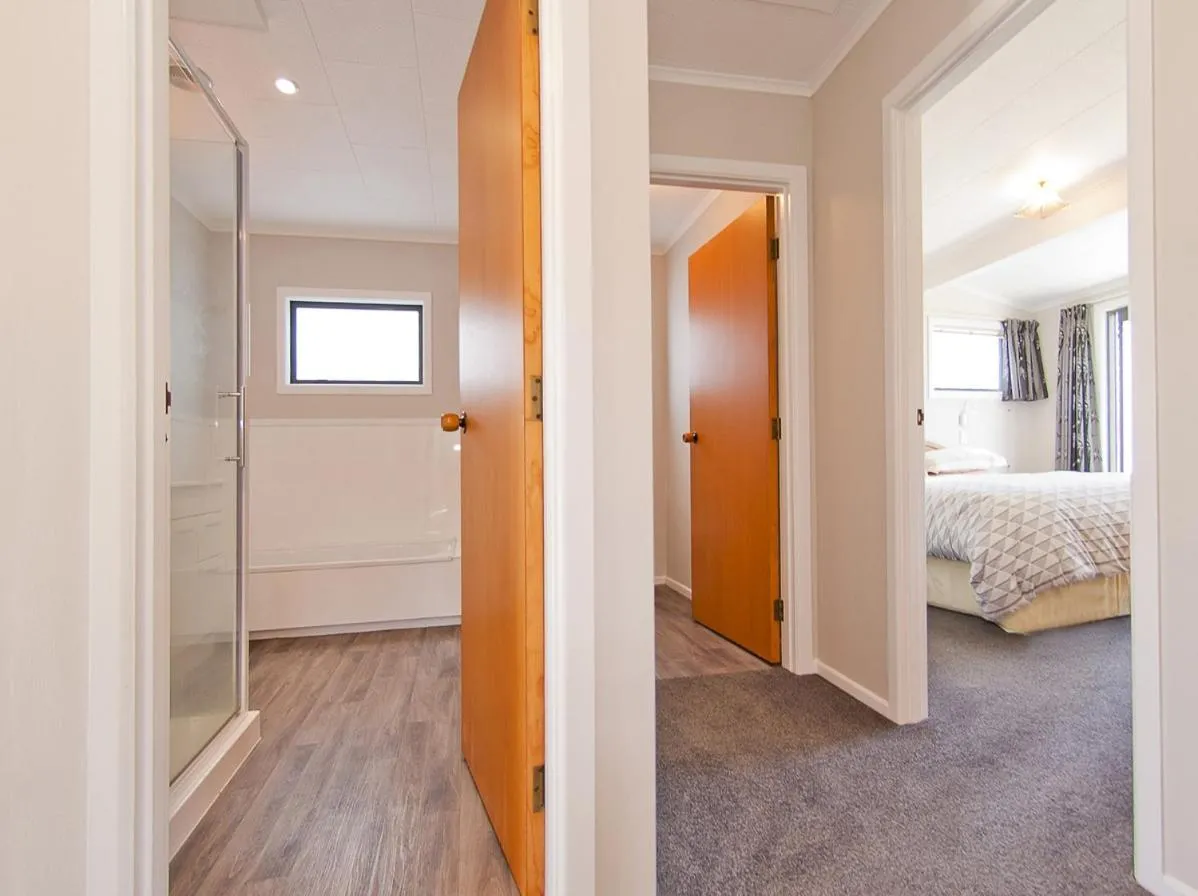 Property building, Bed in Sea Breeze - Whangamata Holiday Home
