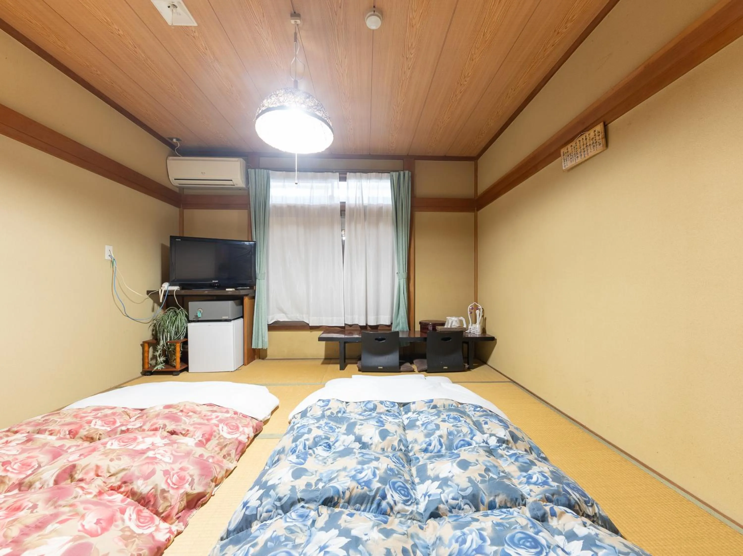 Bed in Tabist Hotel Iyashi no Sato