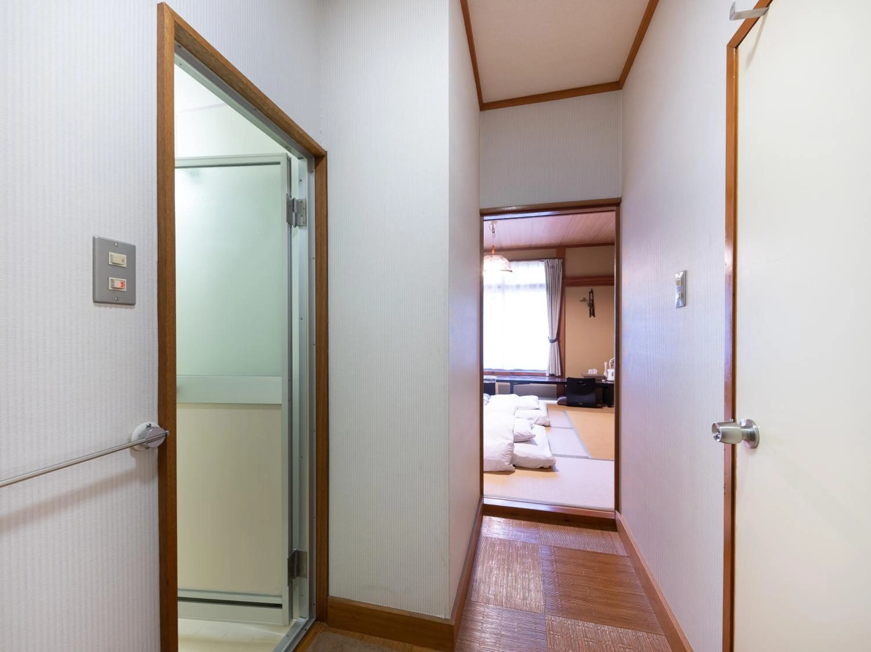 Bed in Tabist Hotel Iyashi no Sato