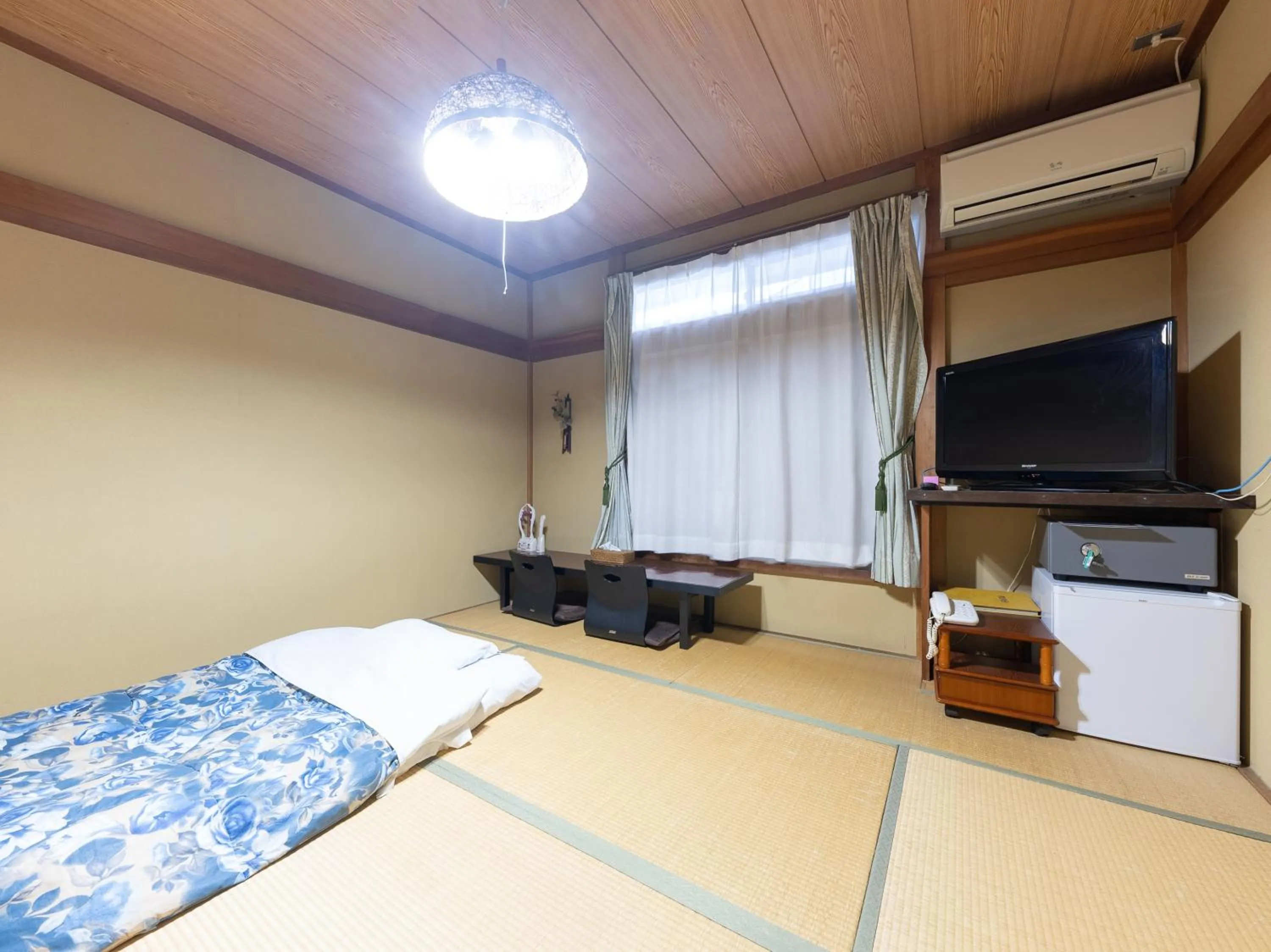 Bed in Tabist Hotel Iyashi no Sato