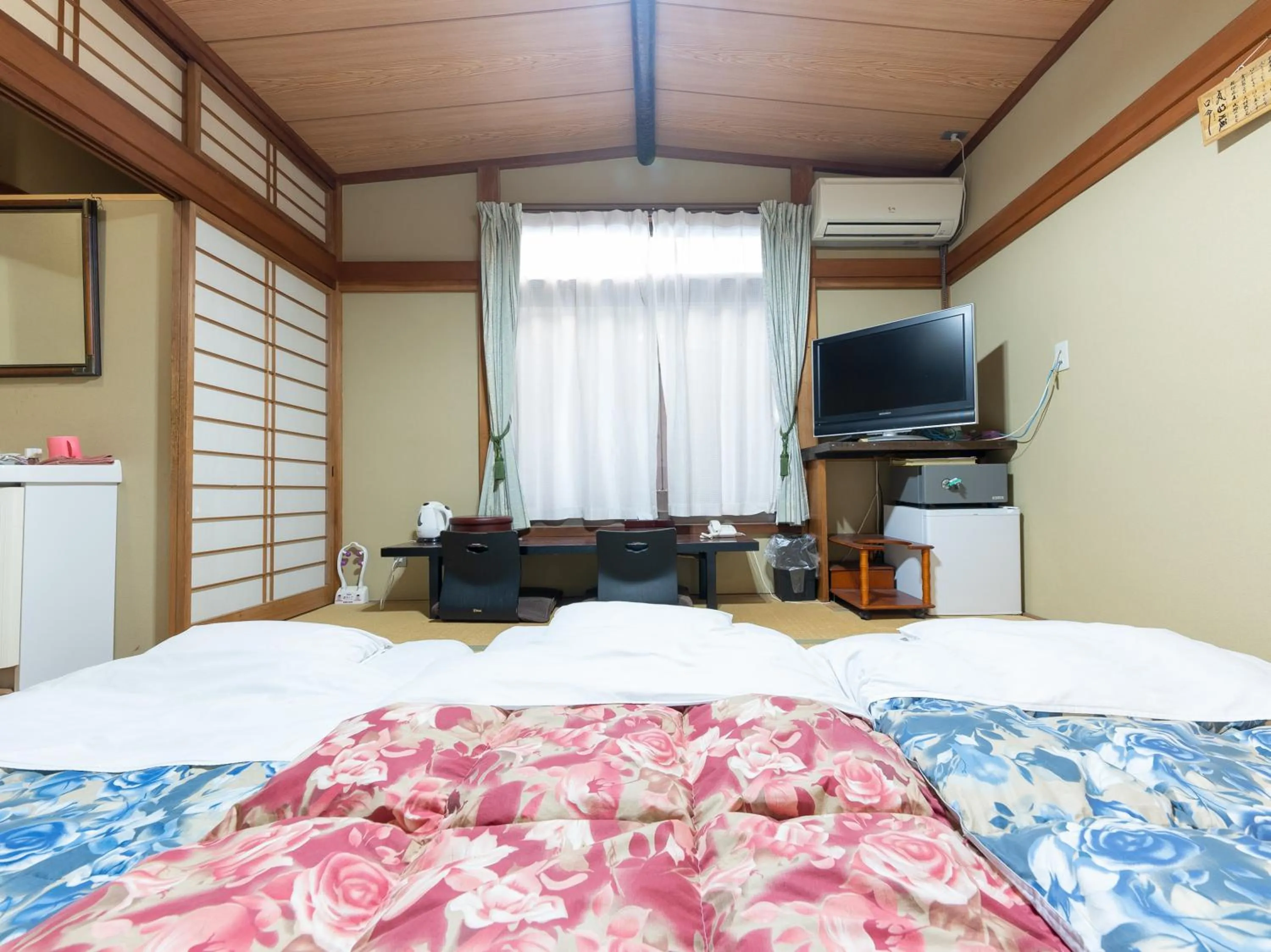 Bed in Tabist Hotel Iyashi no Sato