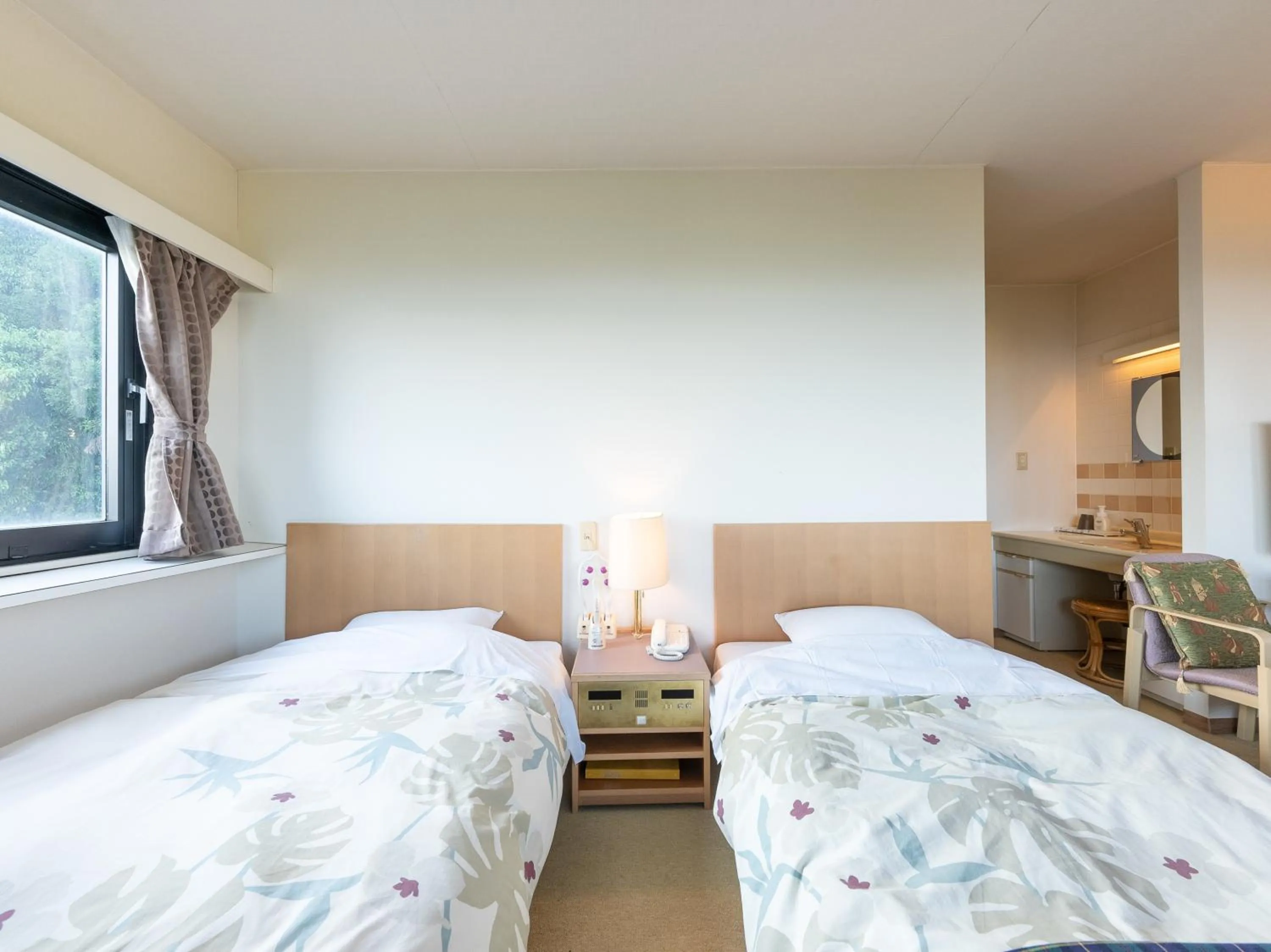 Bed in Tabist Hotel Iyashi no Sato