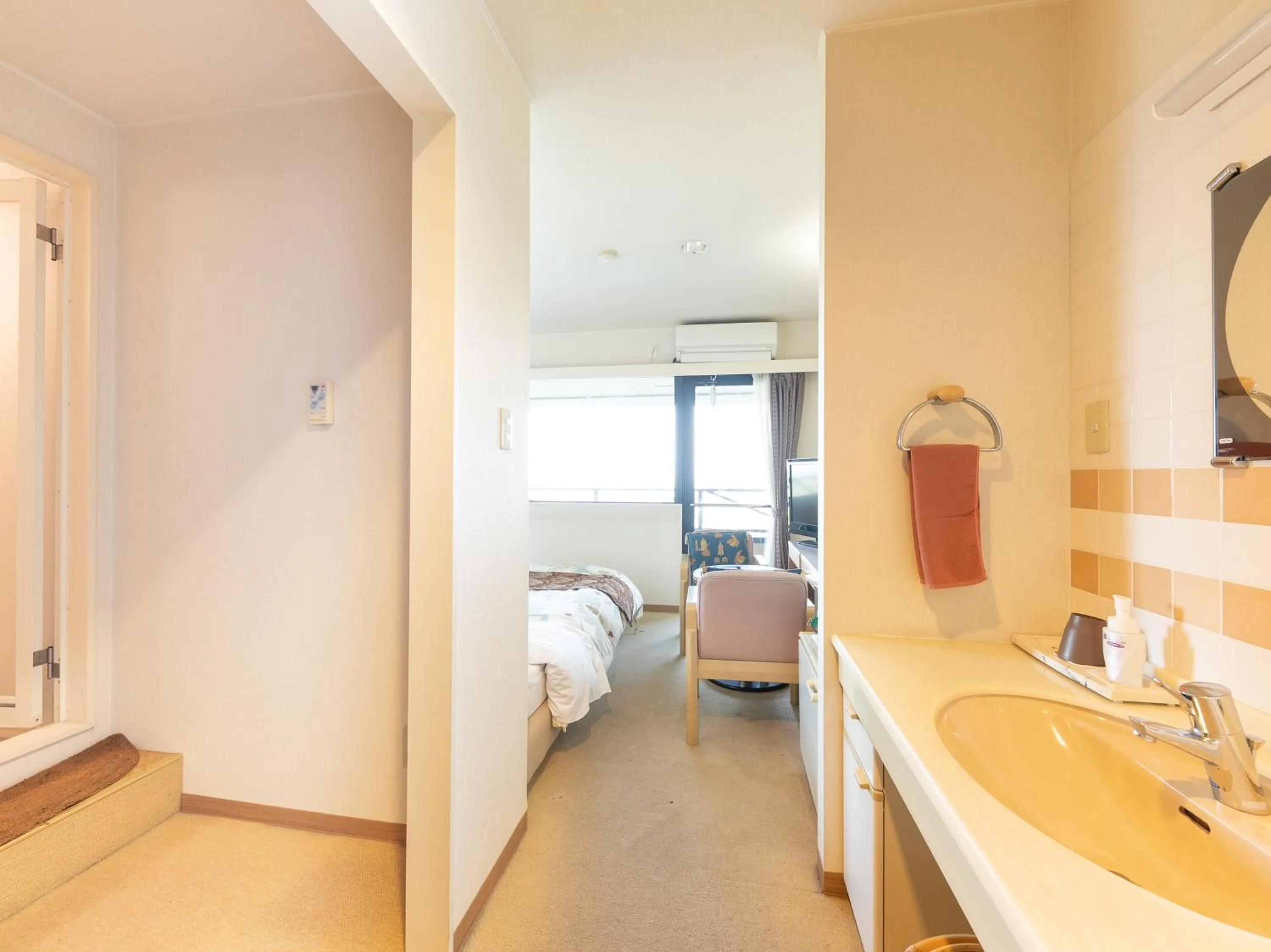 Bed in Tabist Hotel Iyashi no Sato