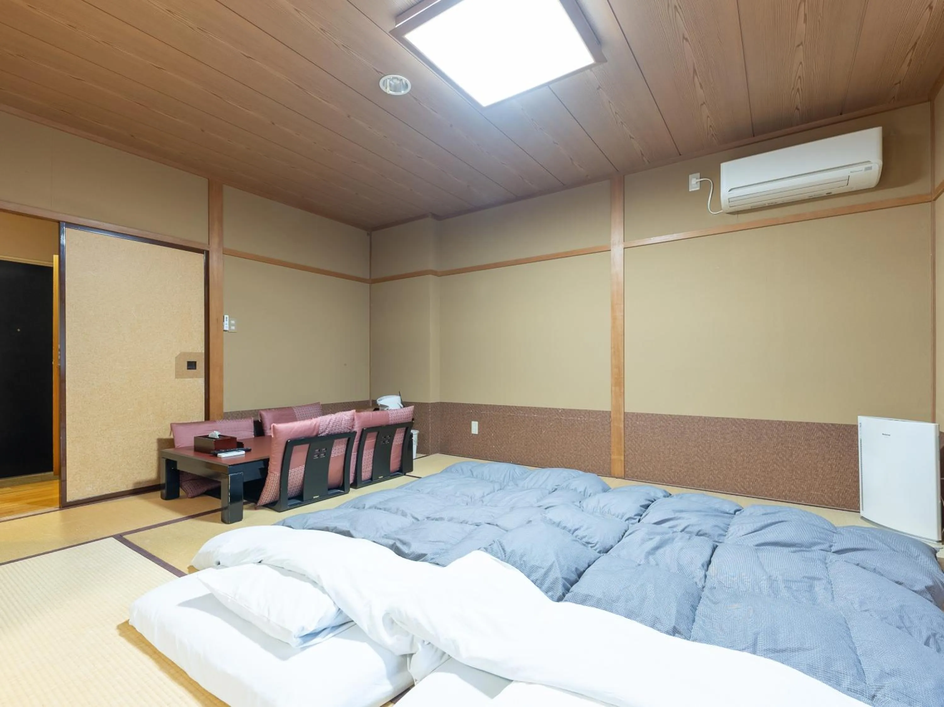 Bed in Tabist Hotel Iyashi no Sato