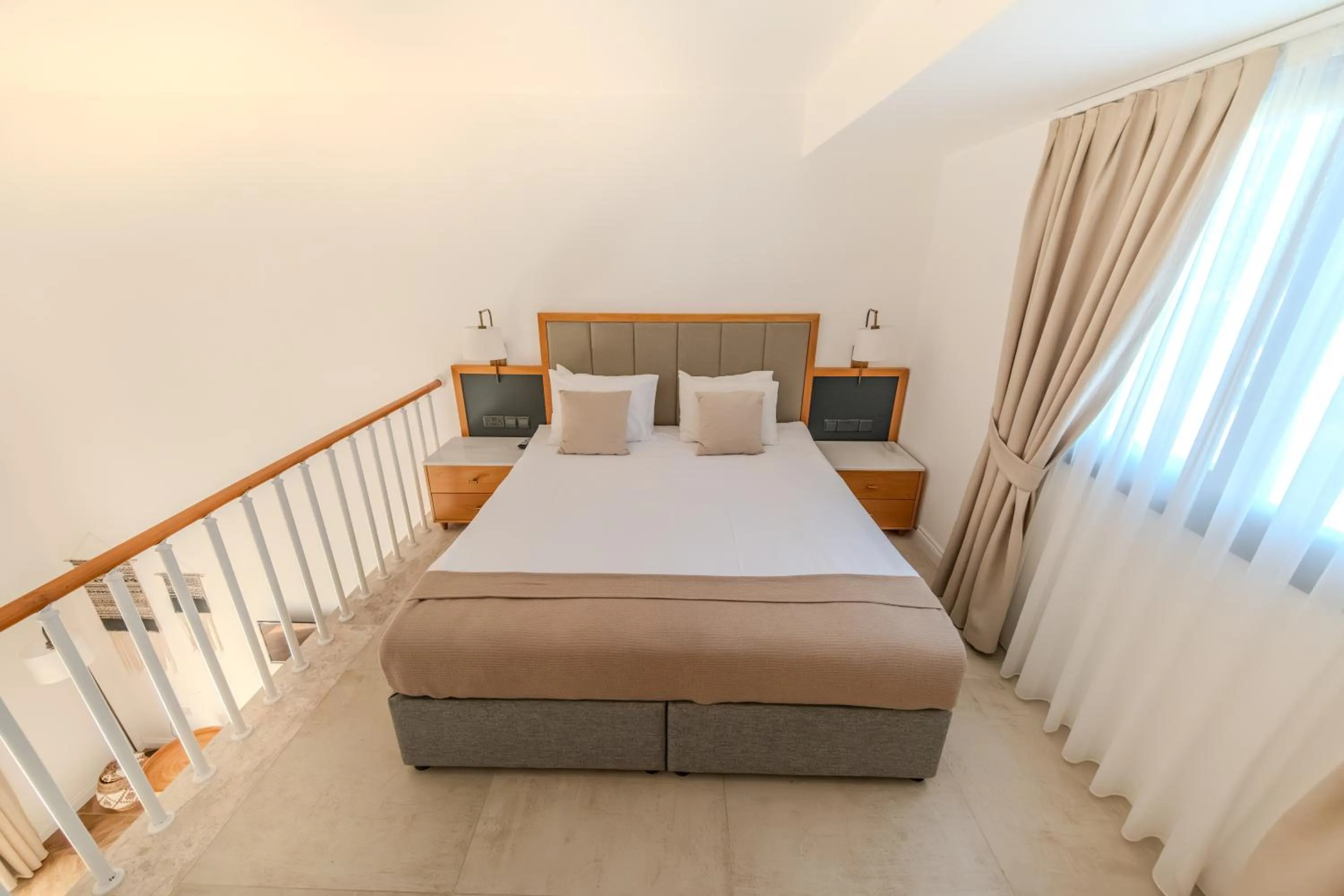 Bed in Palmonte Suites Hotel & SPA