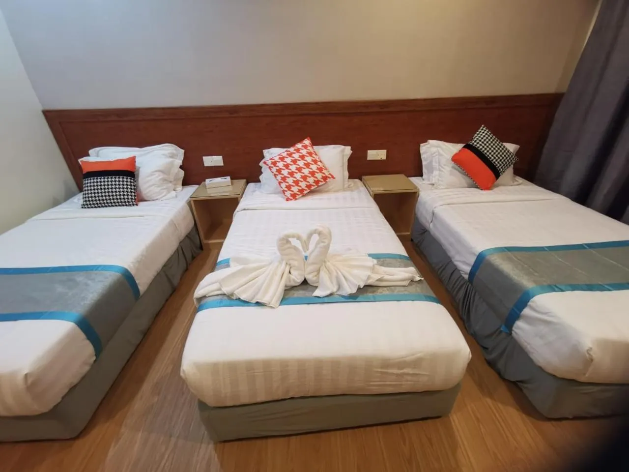 Bed in TD CAPITAL HOTEL