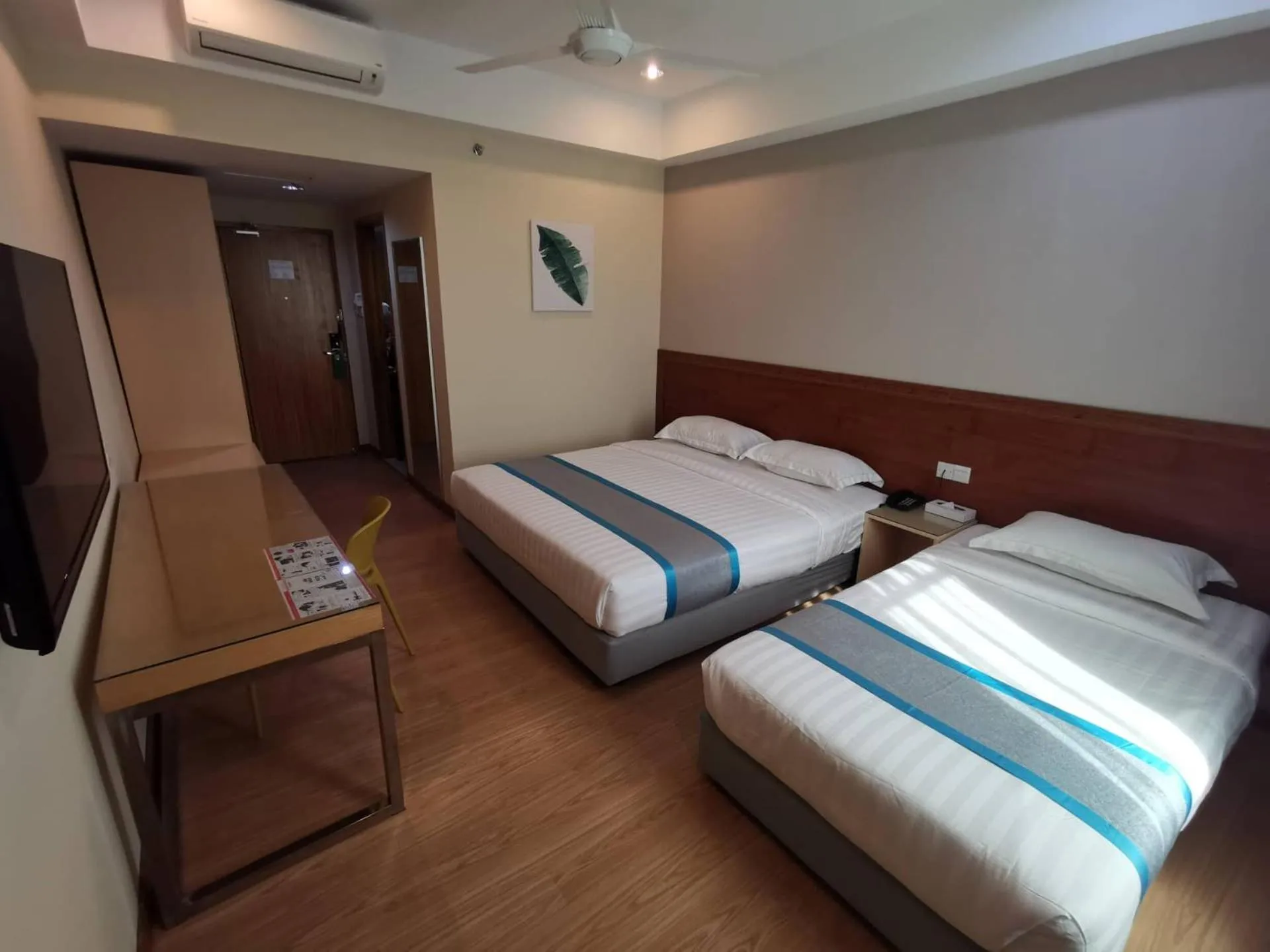 Bed in TD CAPITAL HOTEL