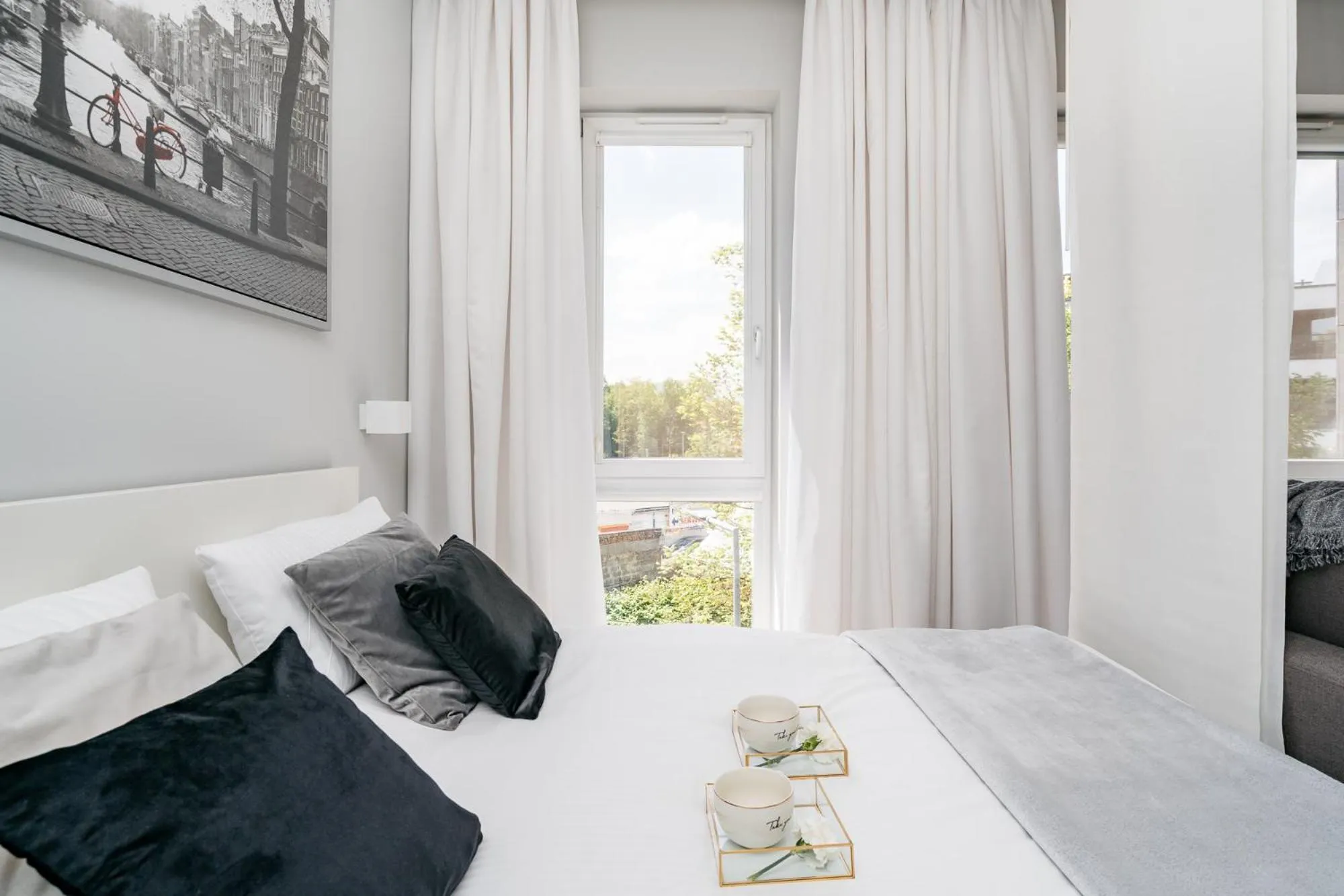 Seating area, Bed in Bright Apartments - LoftAffair