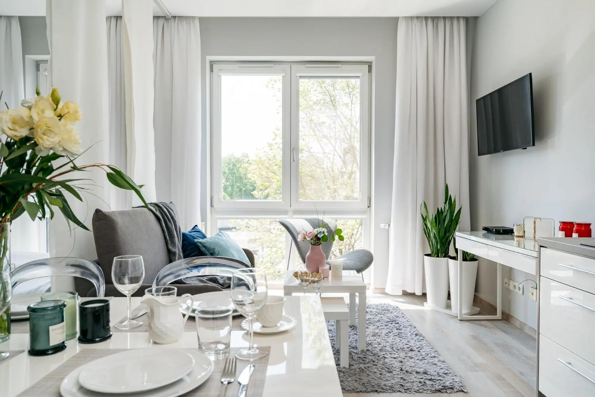 Living room in Bright Apartments - LoftAffair