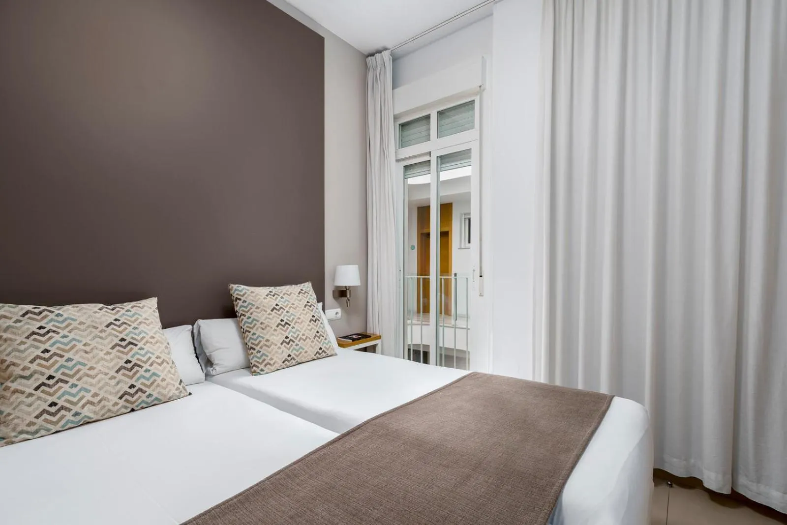 Bed in Suites Del Pintor