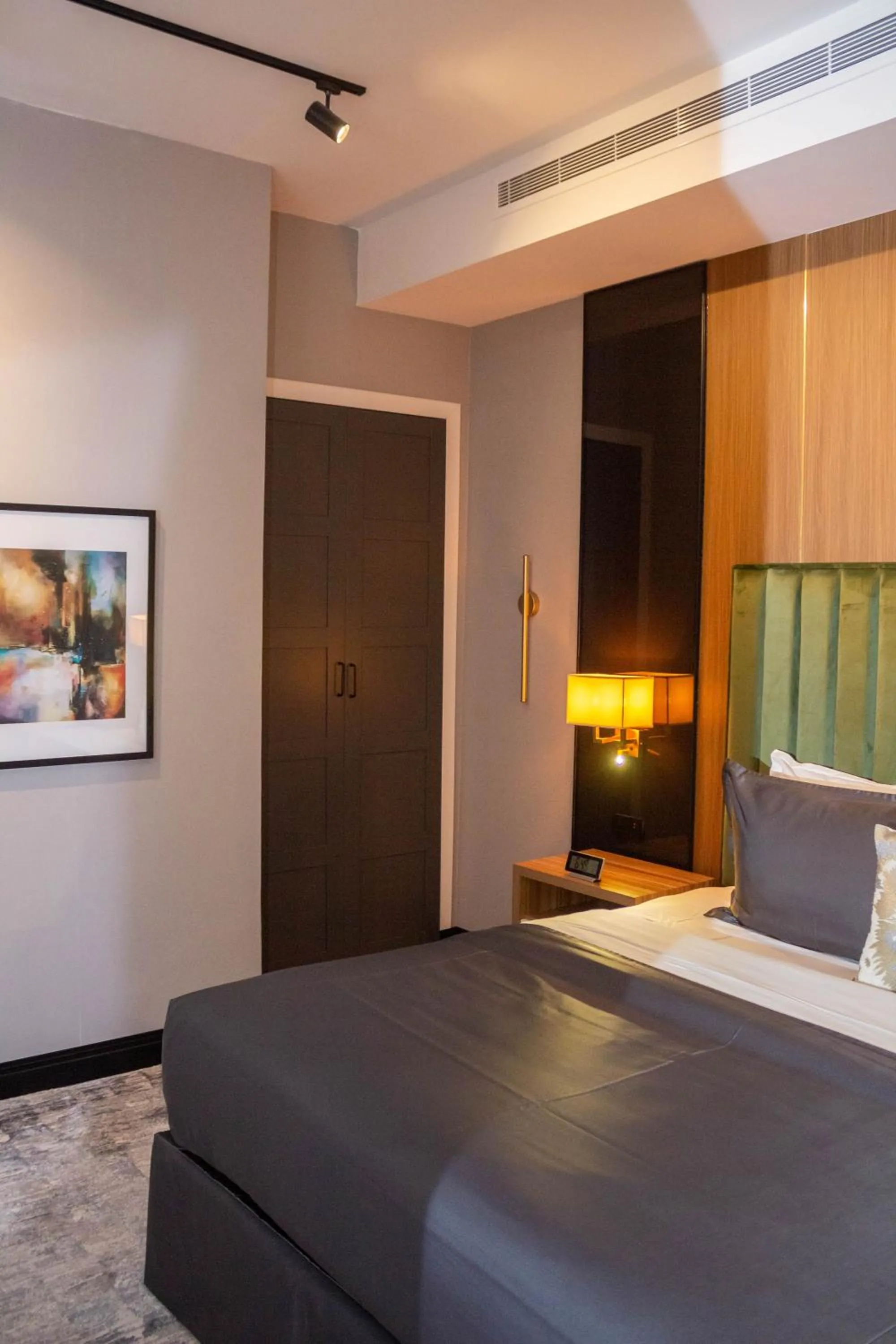 wardrobe, Bed in Dana Hotel