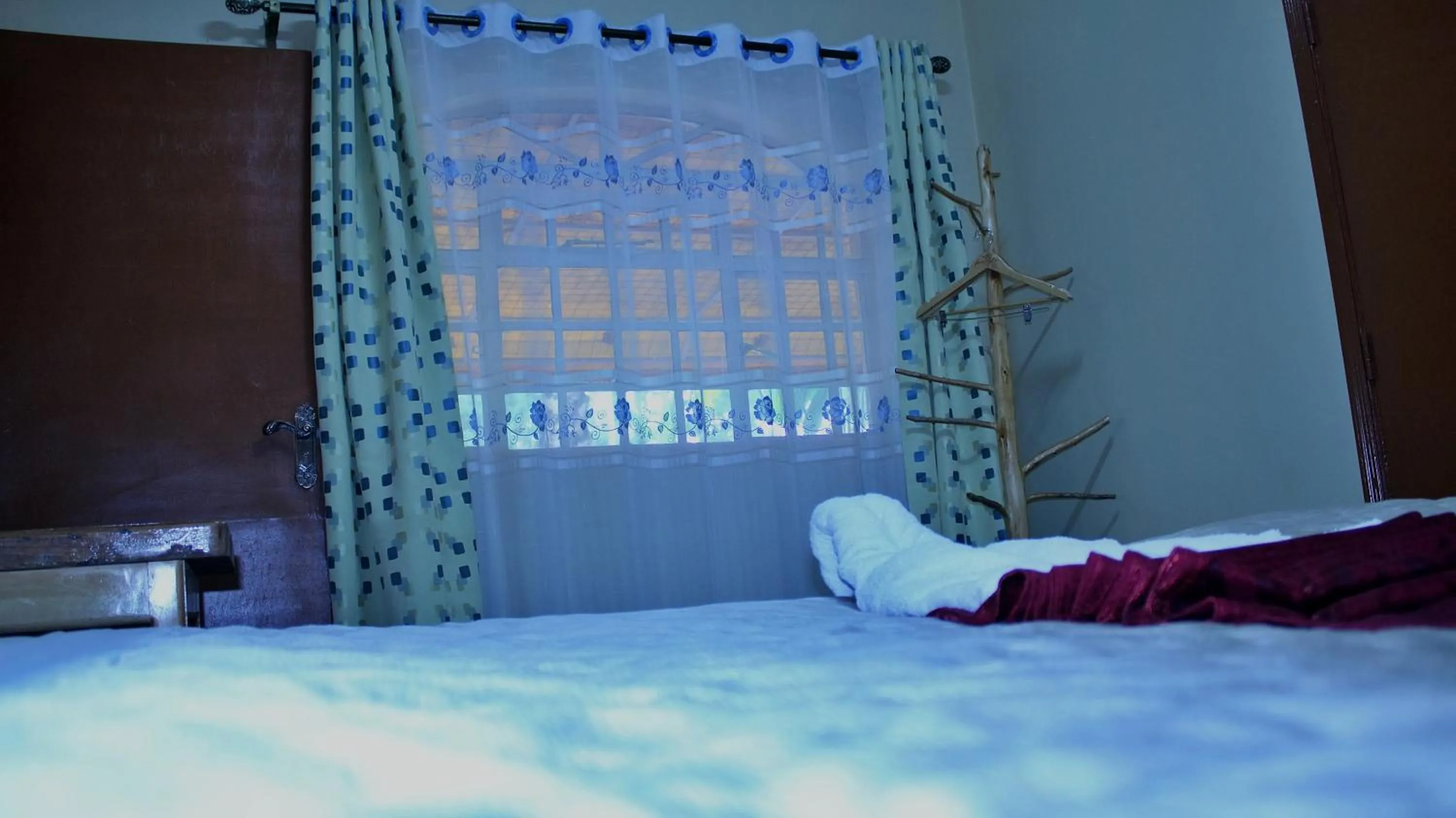 View (from property/room), Bed in Tranquil Homestays