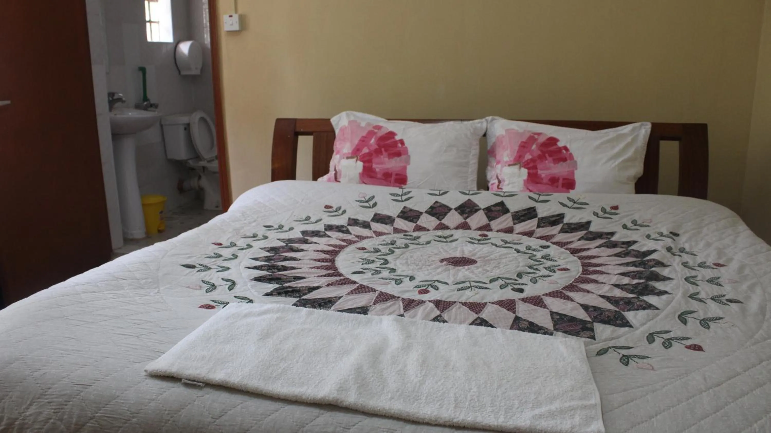 Bed in Tranquil Homestays