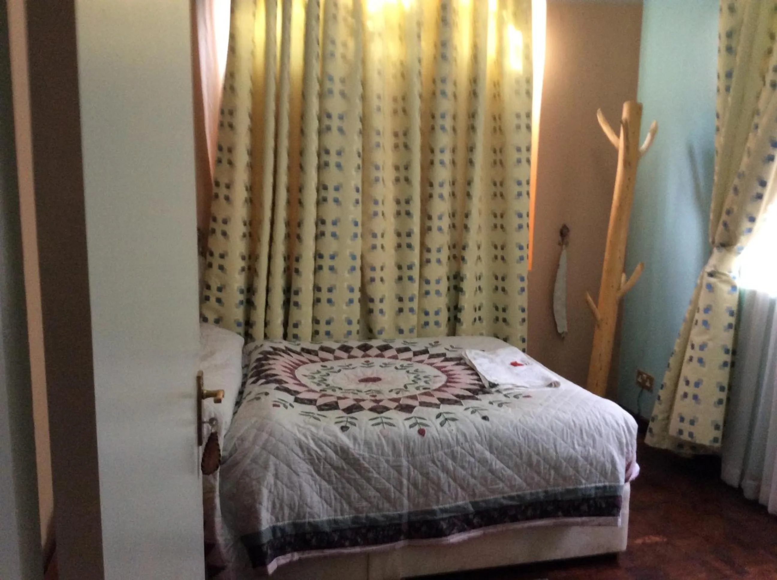 Bed in Tranquil Homestays