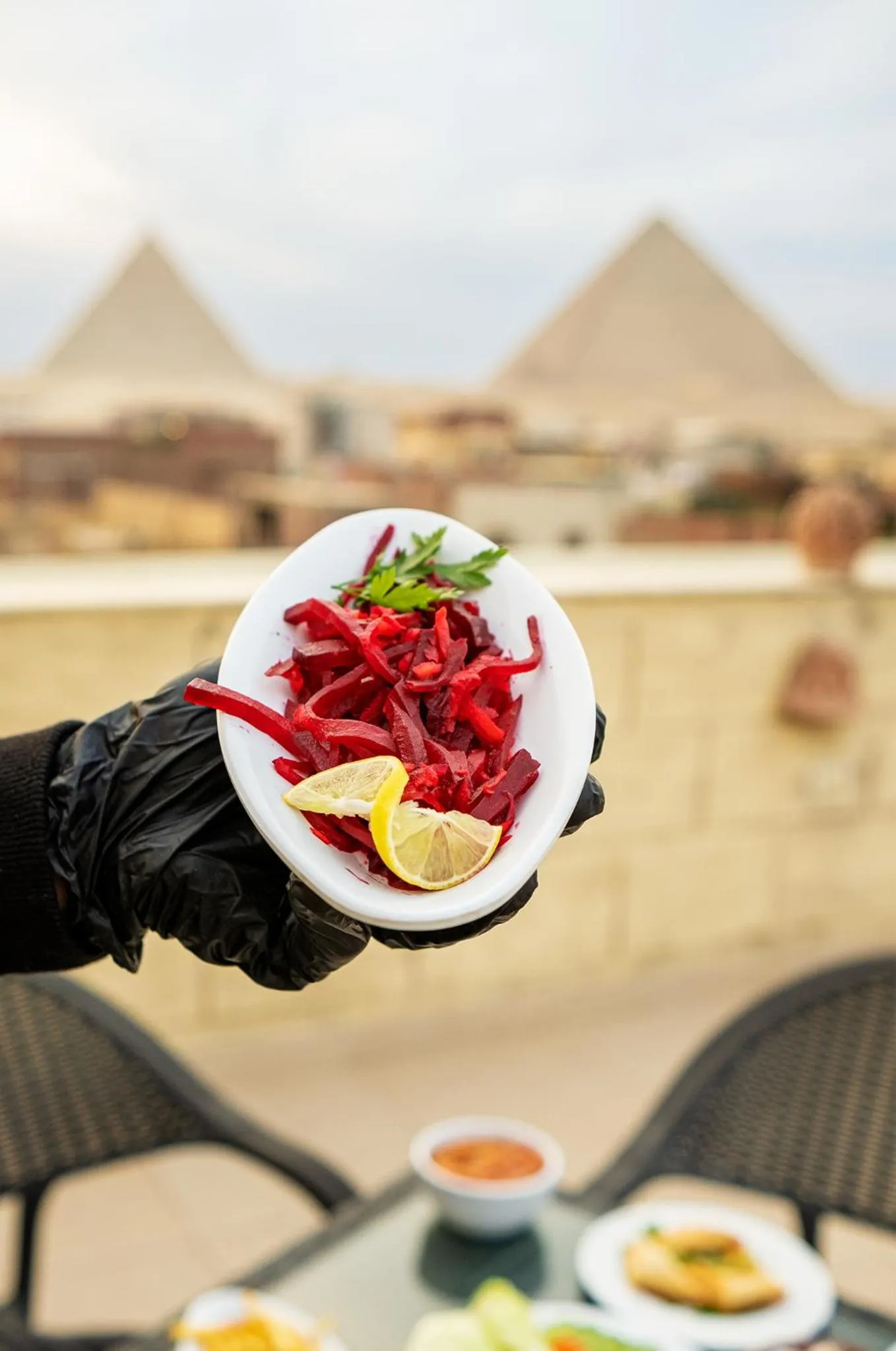 Restaurant/places to eat in Hassan Pyramids Hotel & free access Rooftop & airport pickup
