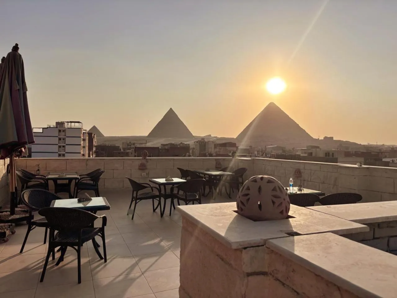 Patio in Hassan Pyramids Hotel & free access Rooftop & airport pickup
